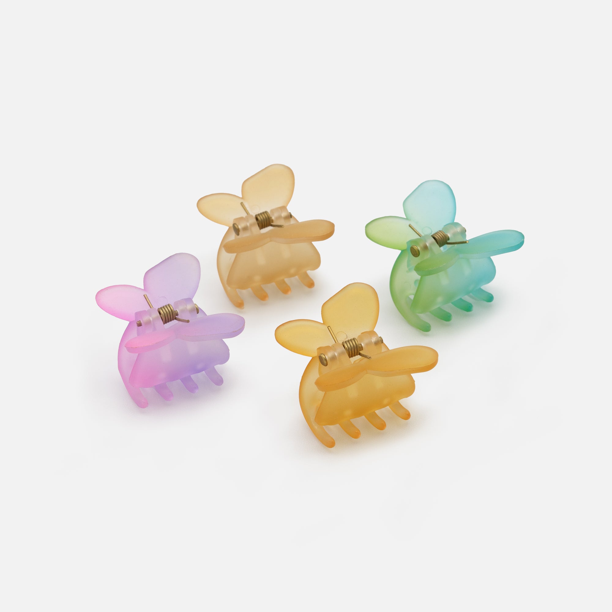 Set of four small multi-colored butterfly clips