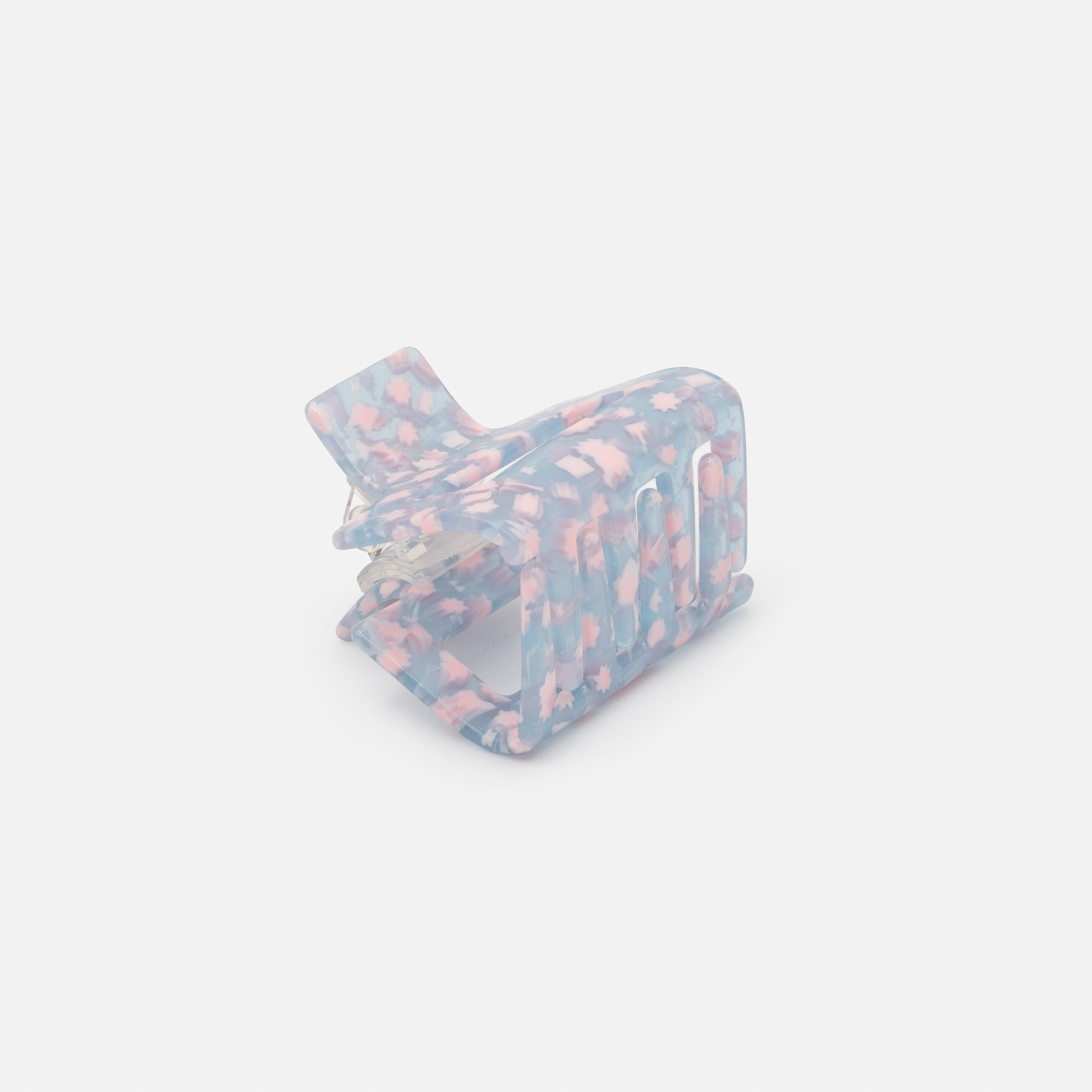 Moyenne pince rectangulaire bleue à motifs roses