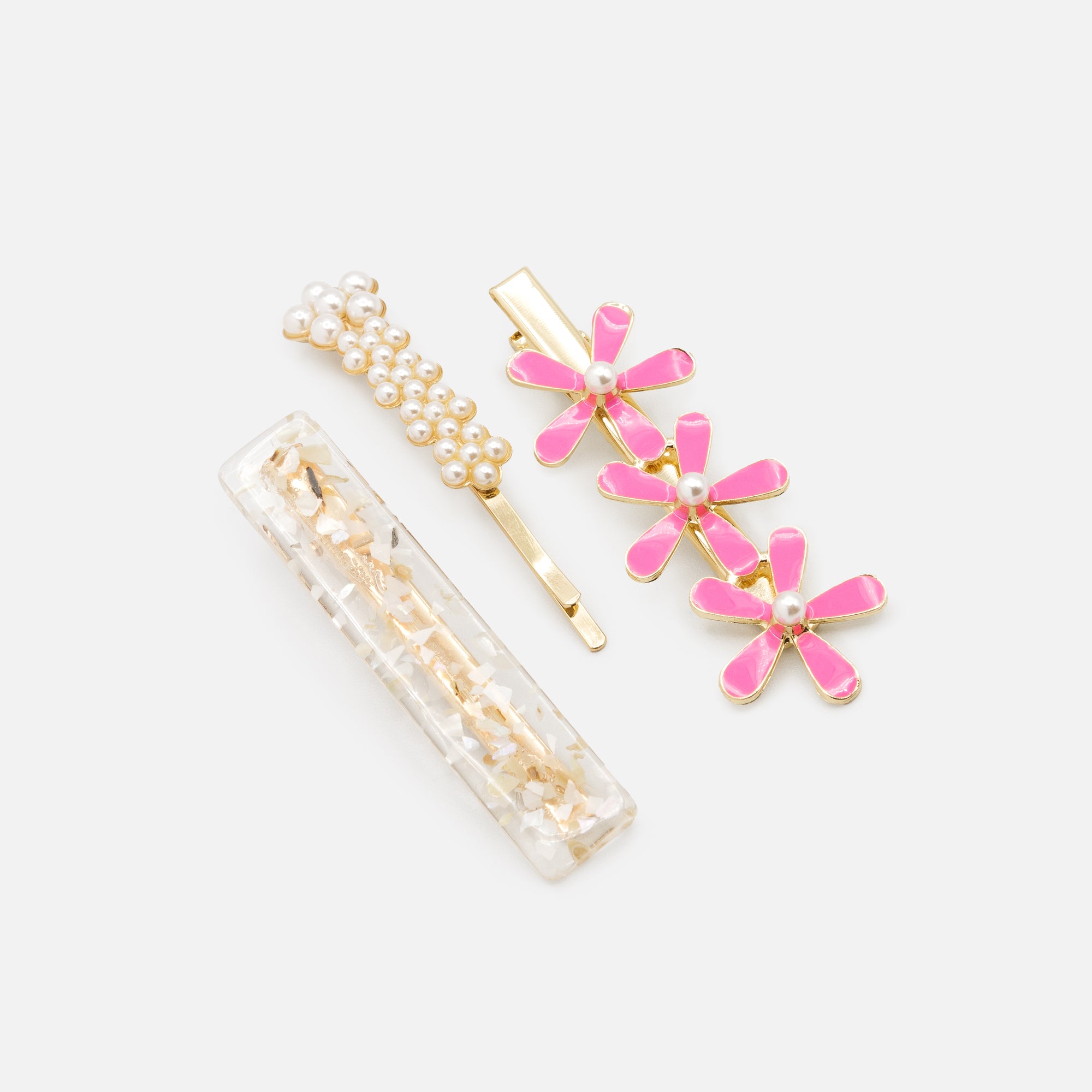 Set of three golden clips with pink flowers and pearls