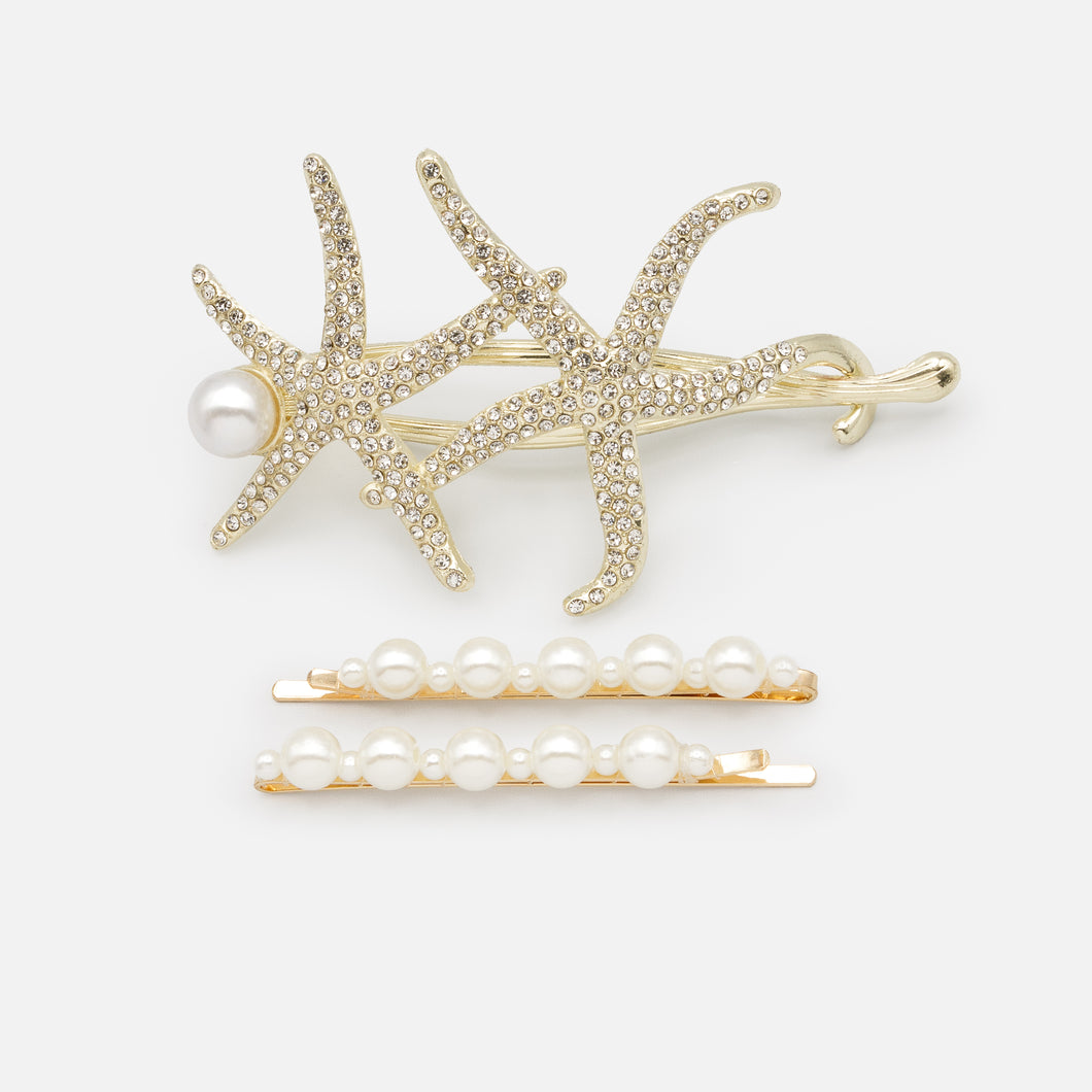 Set of three gold starfish clips with cubic zirconia and pearls