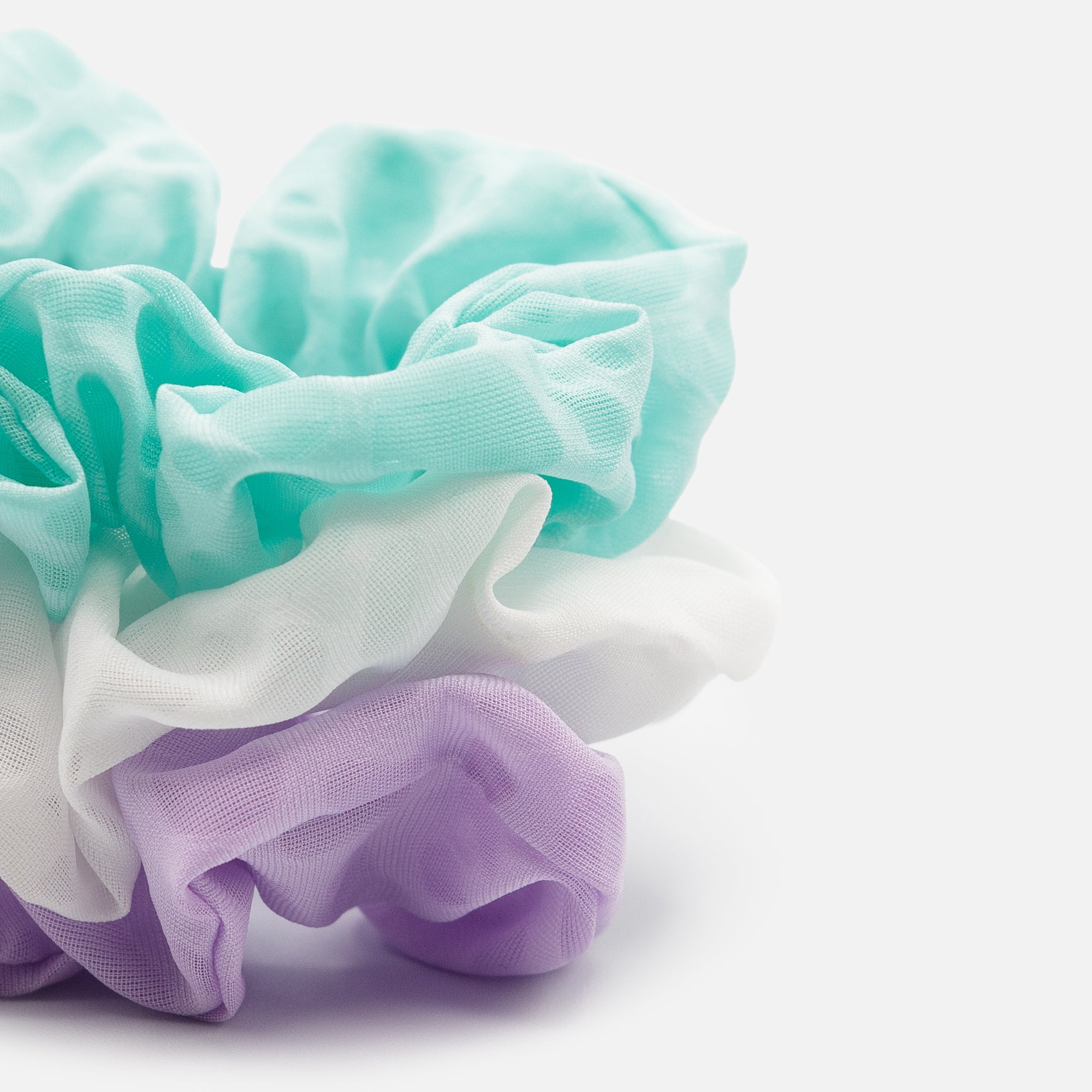 Trio of turquoise, white and mauve scrunchies