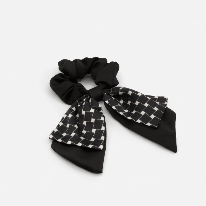 Chouchou noir avec boucle et motif géométrique