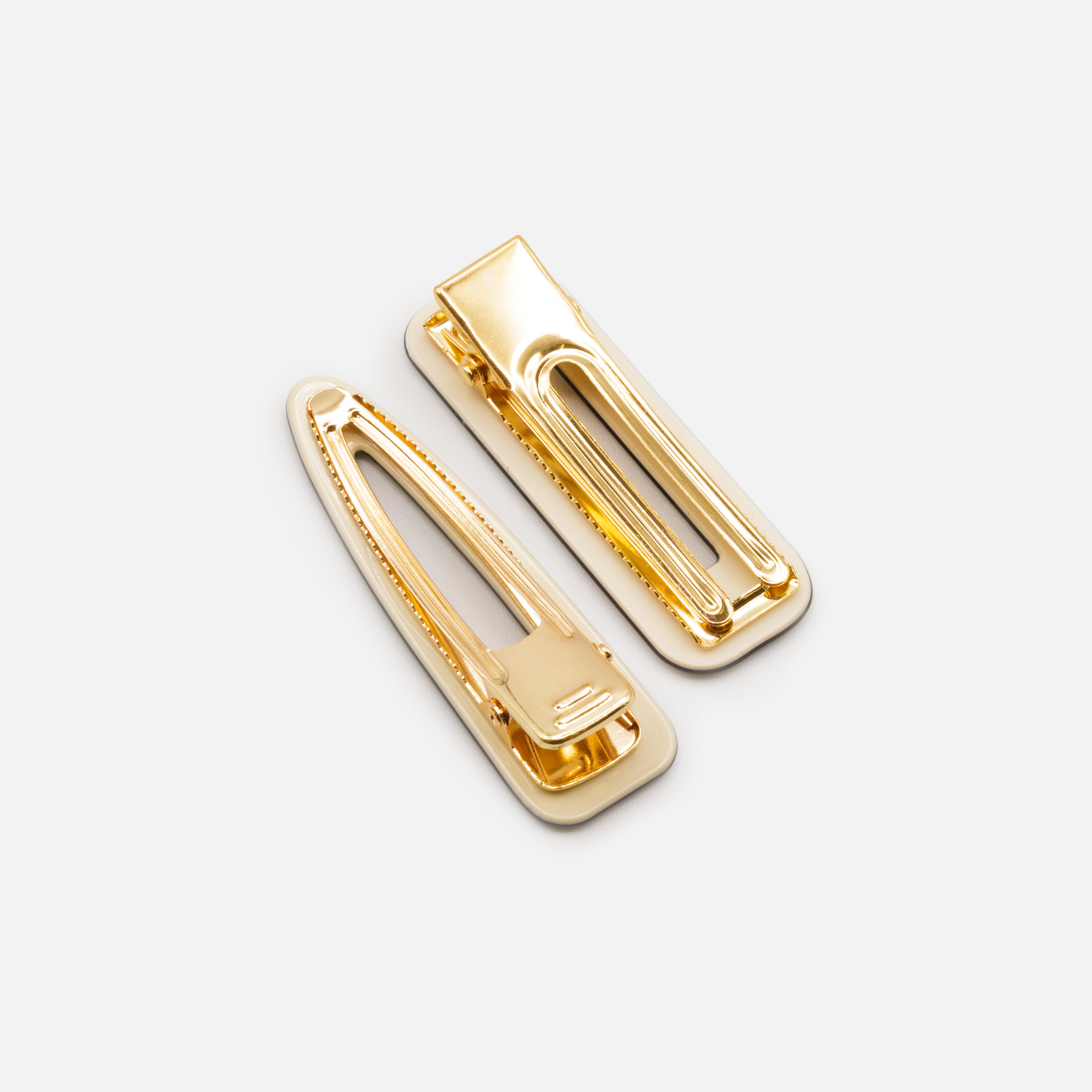 Duo of geometric ivory clips