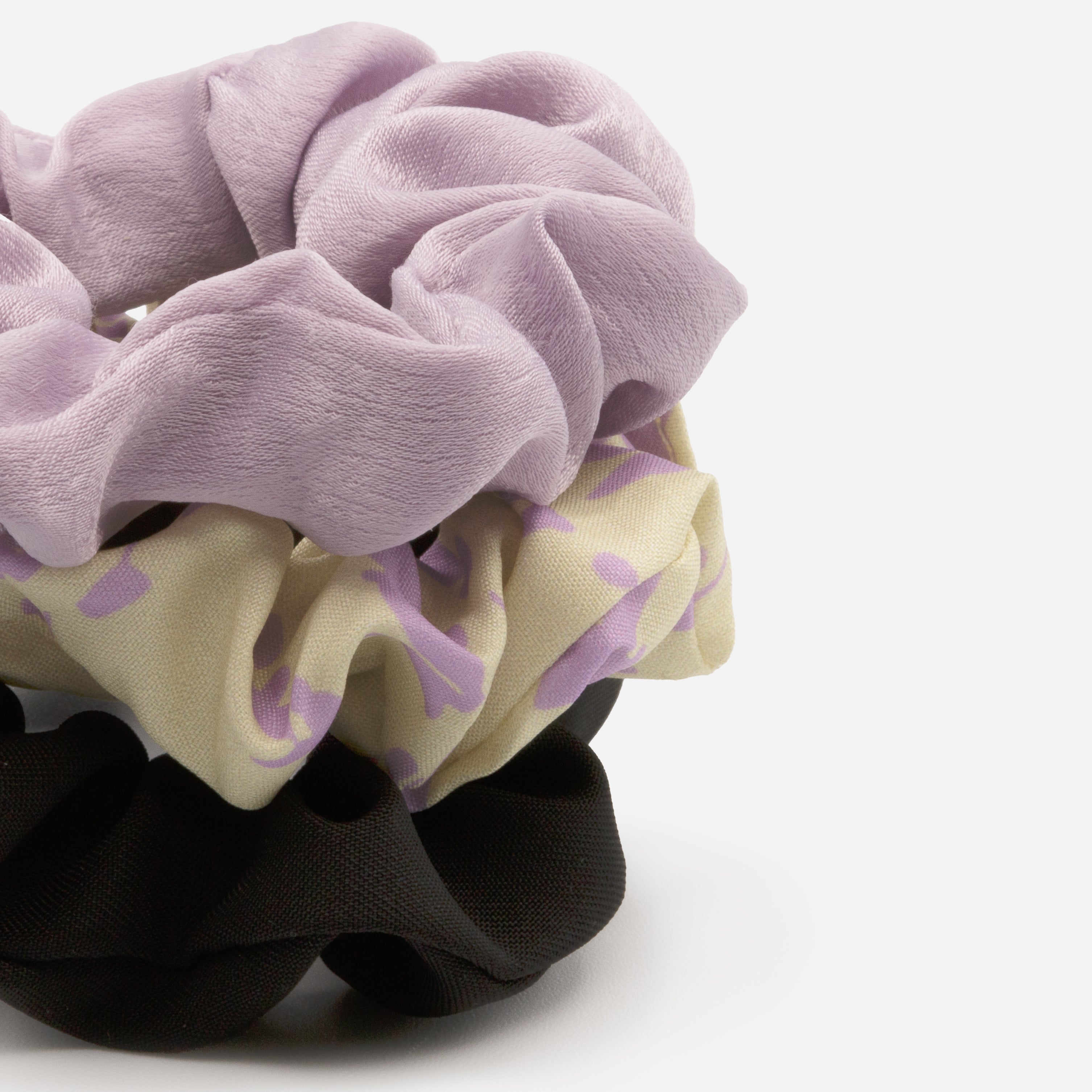 Trio of black, mauve and floral scrunchies