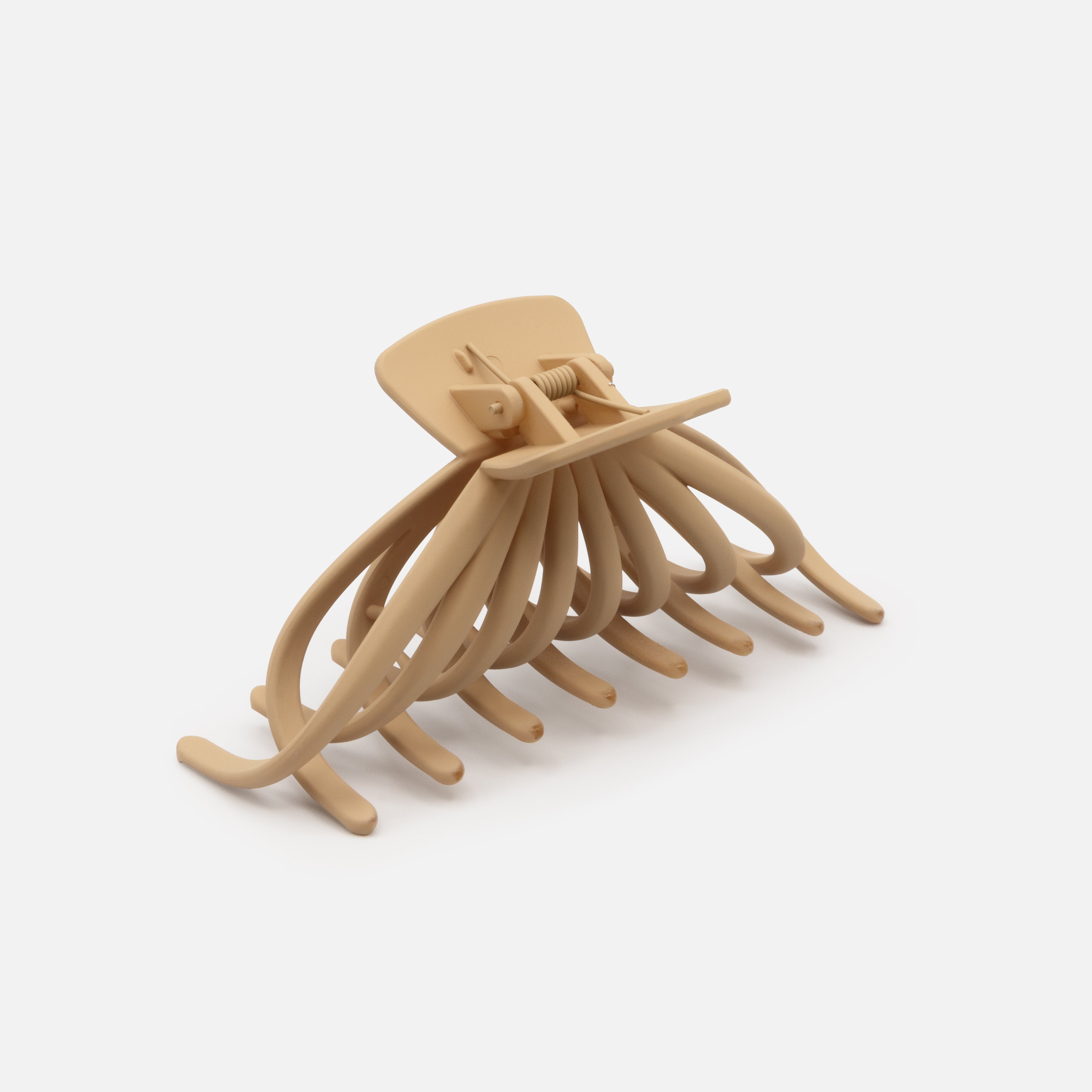 Beige plastic octopus clip with matte finish