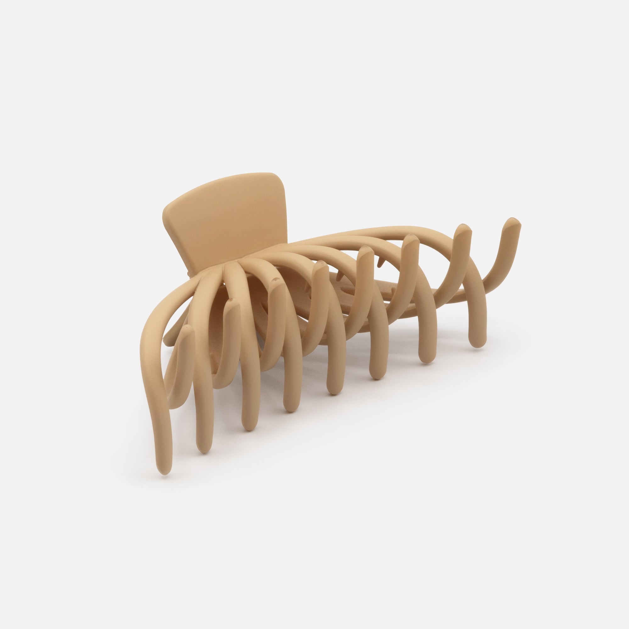 Pince pieuvre beige en plastique au fini mat