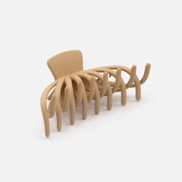 Pince pieuvre beige en plastique au fini mat