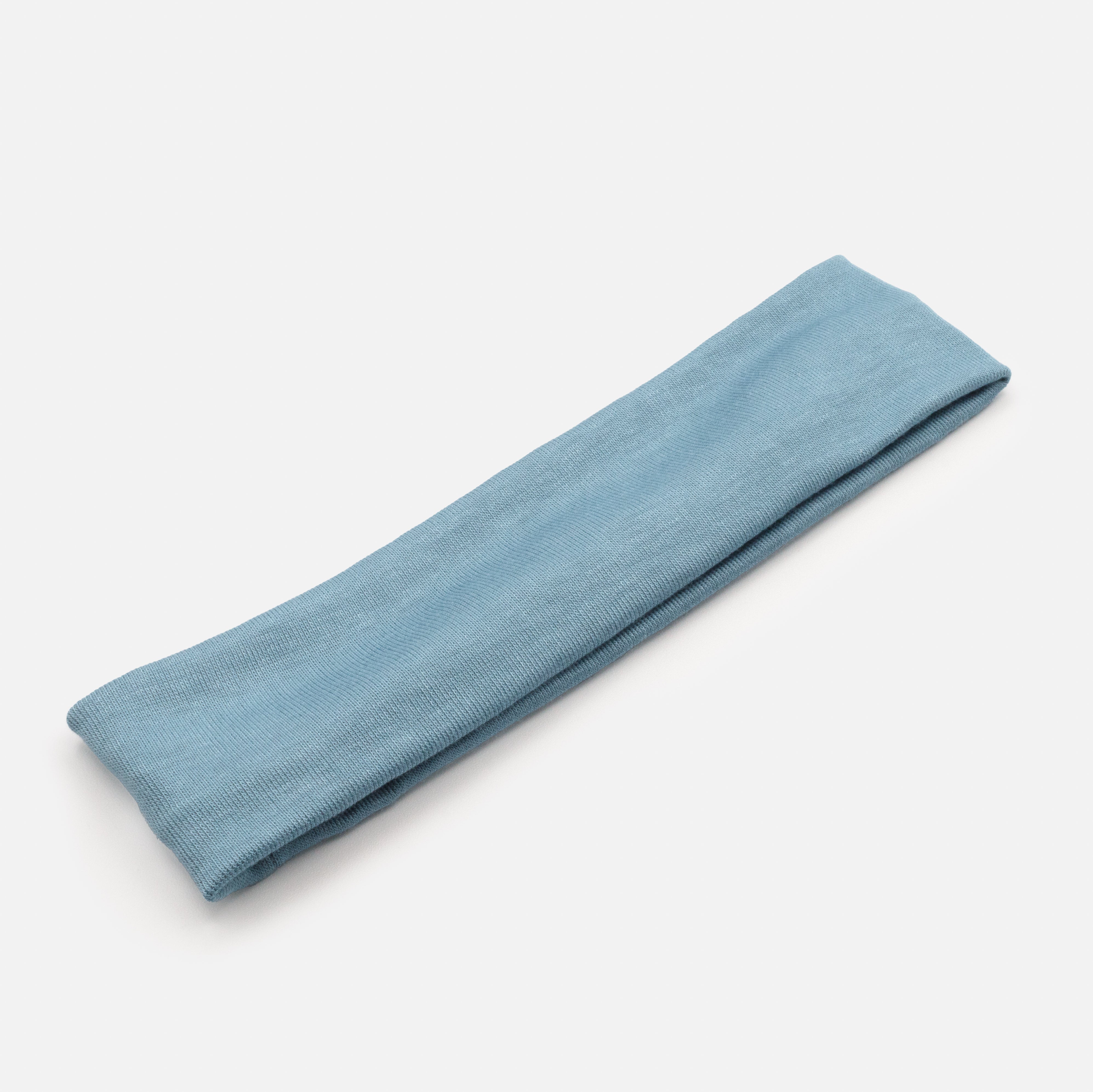 Soft headband in pale blue fabric