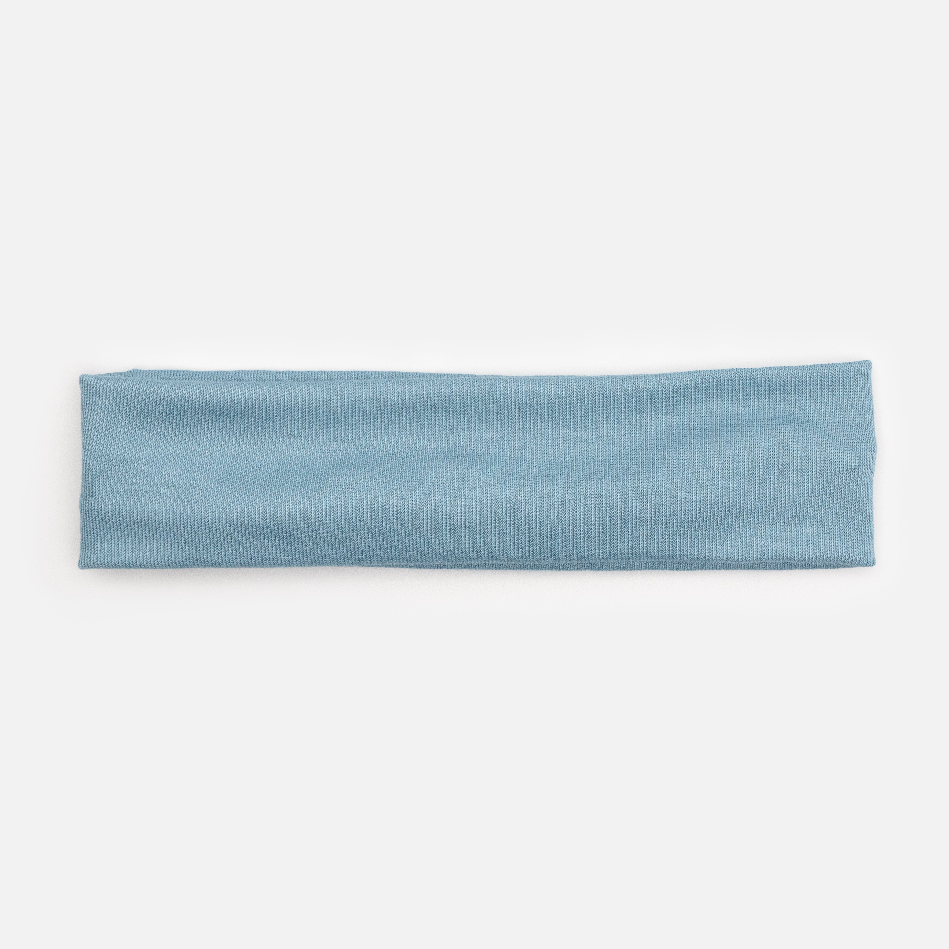 Soft headband in pale blue fabric
