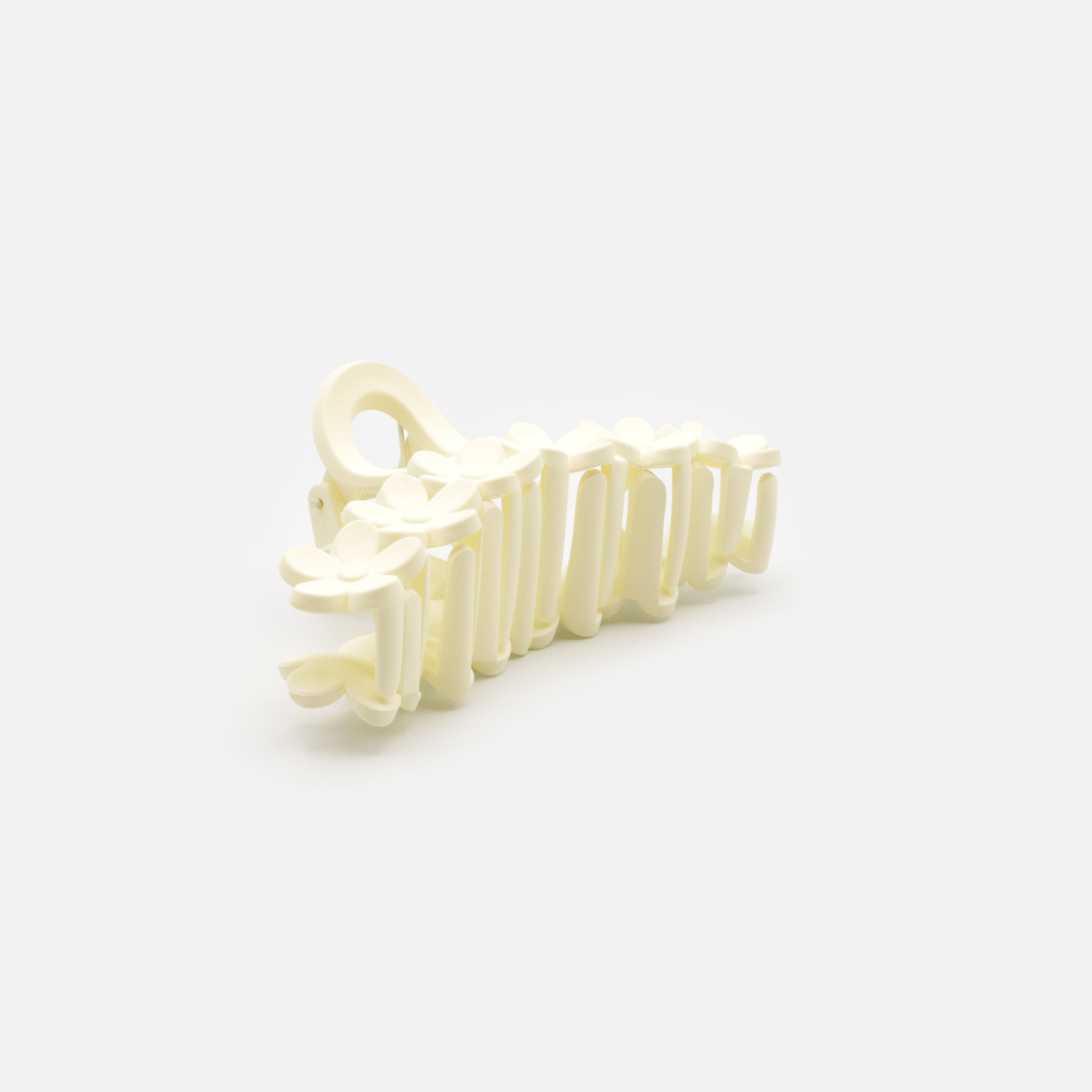 Ivory plastic flower clip with matte finish