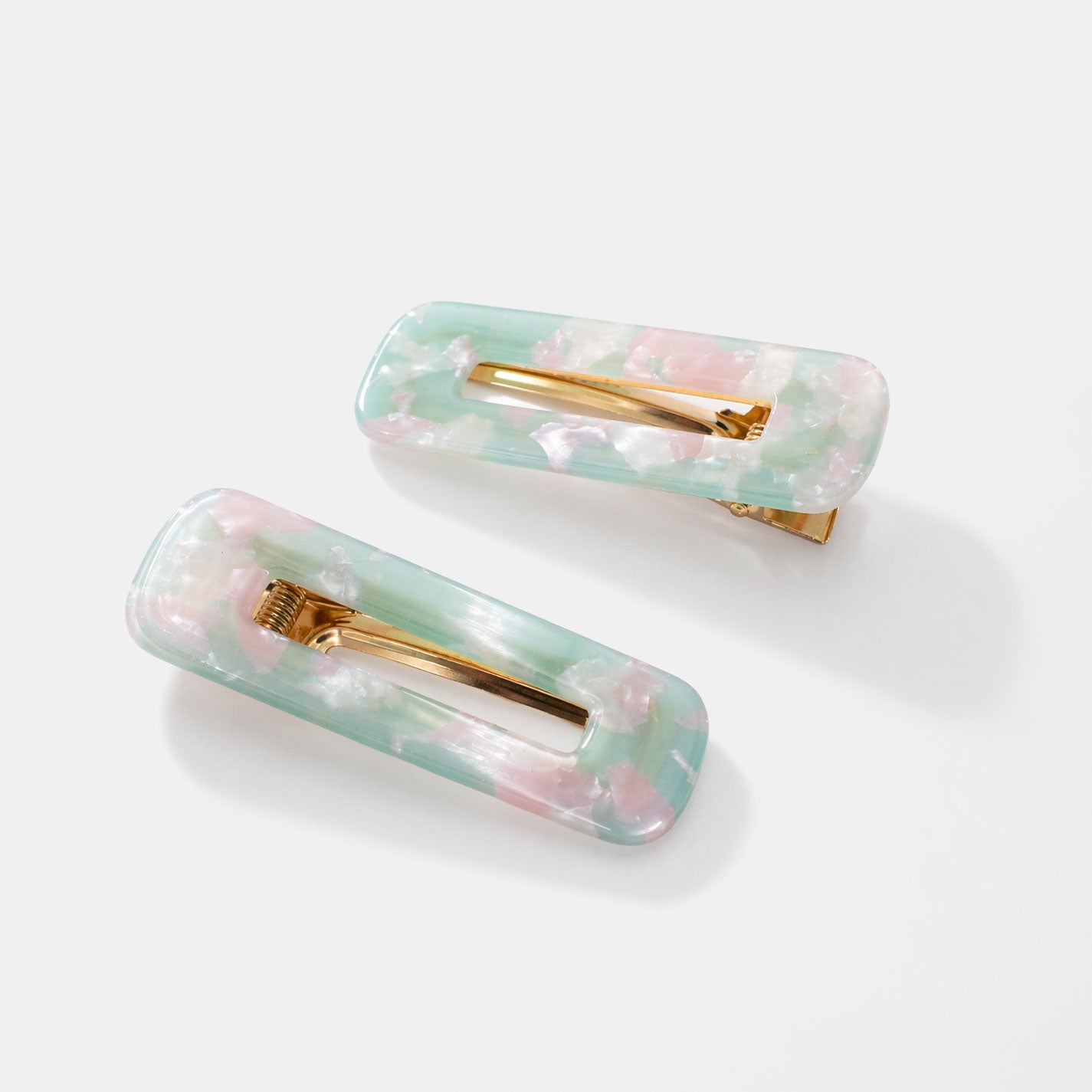 Duo de pinces à cheveux rectangulaires marbrées vert et rose