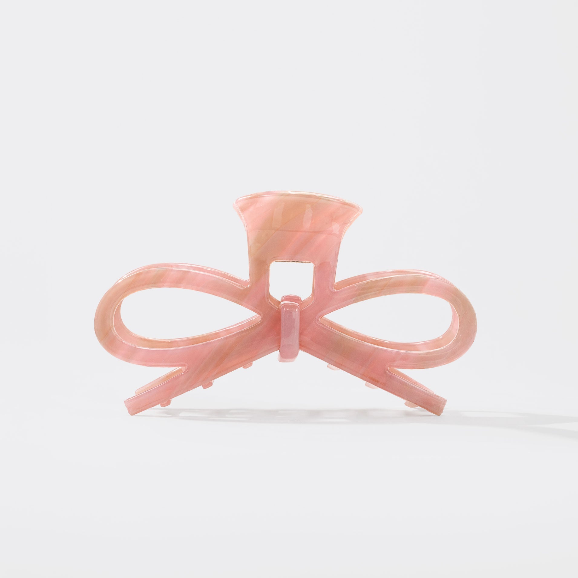 Pince à cheveux rose en forme de nœud