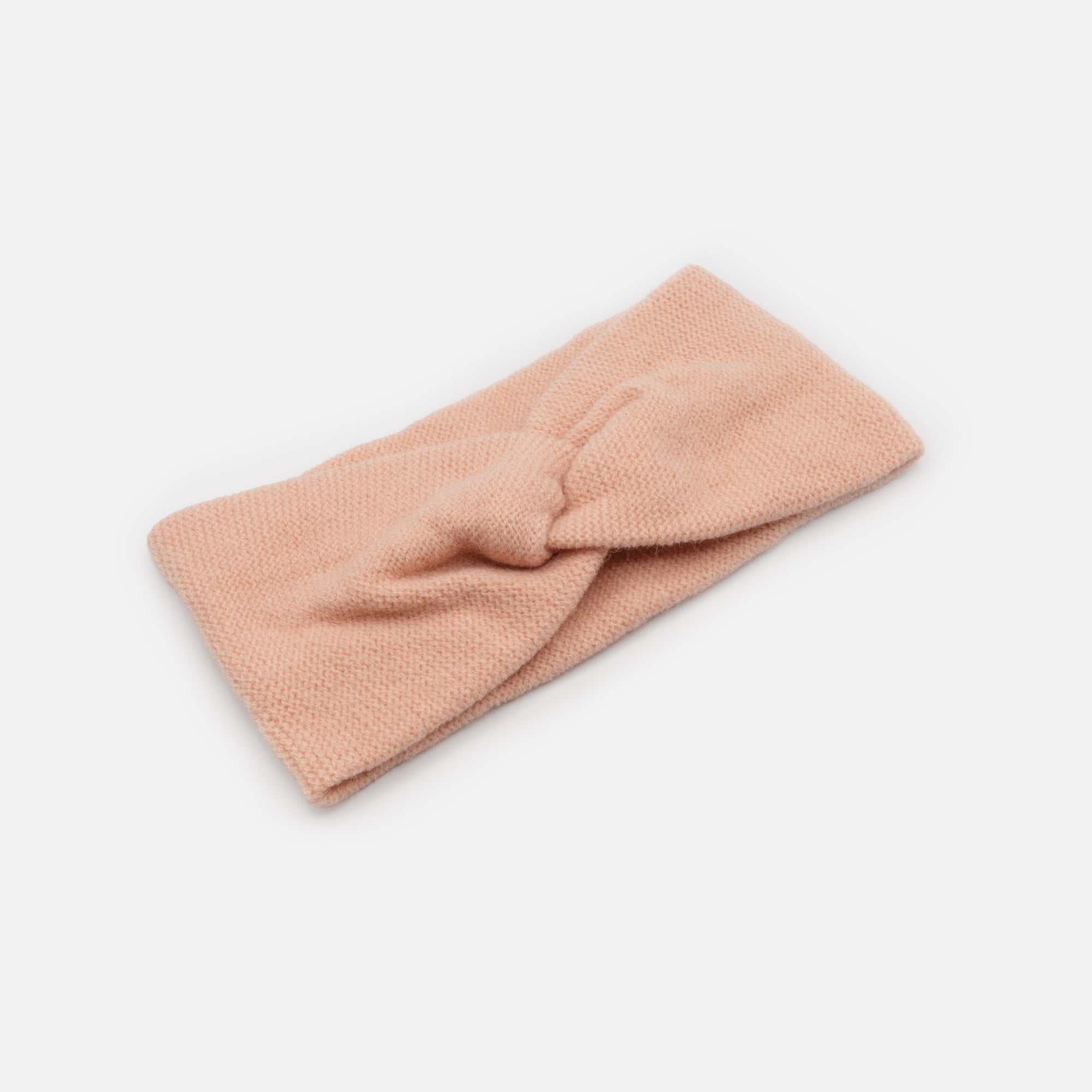 Bandeau vieux rose en tricot à petites mailles avec boucle