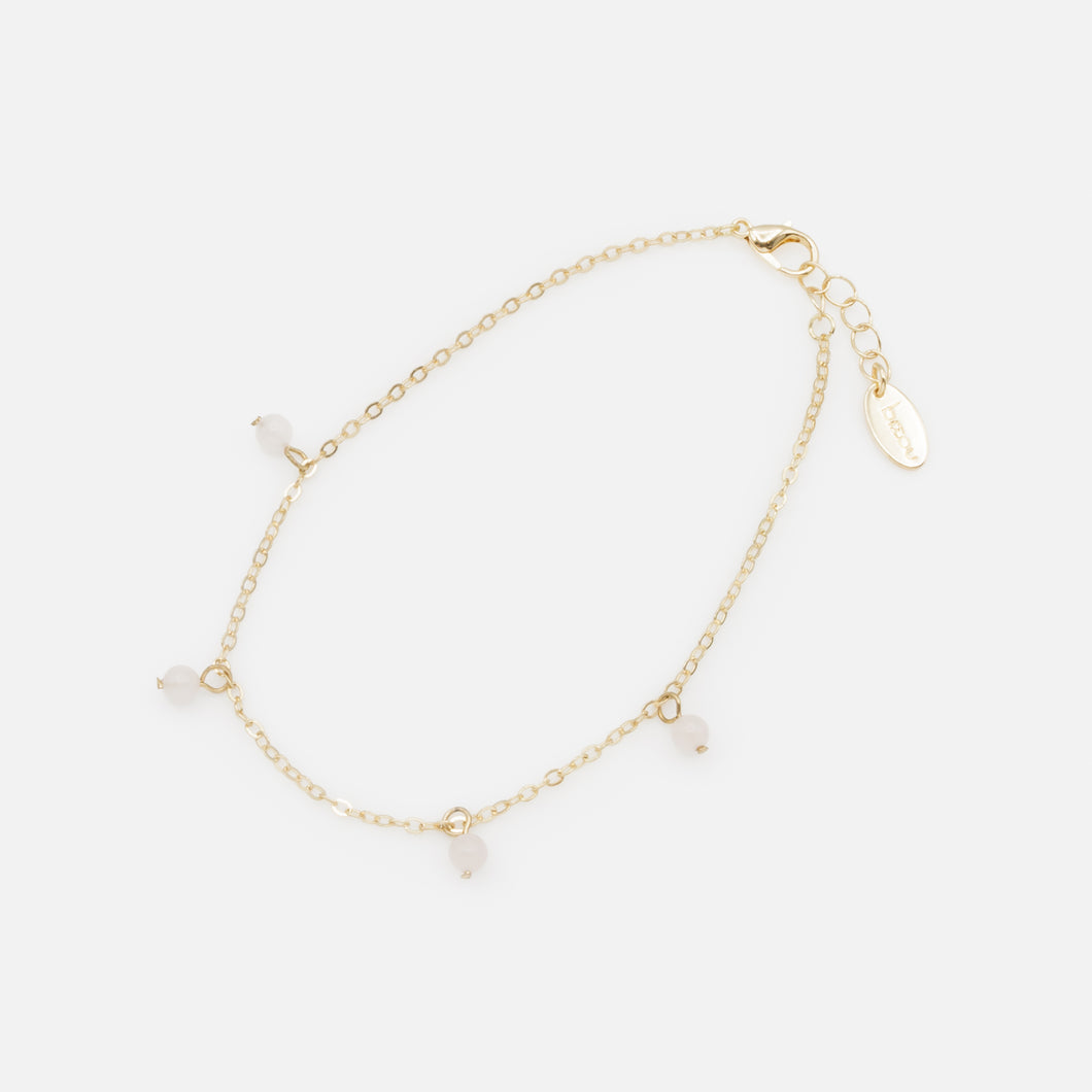Gold anklet with pale pink beads