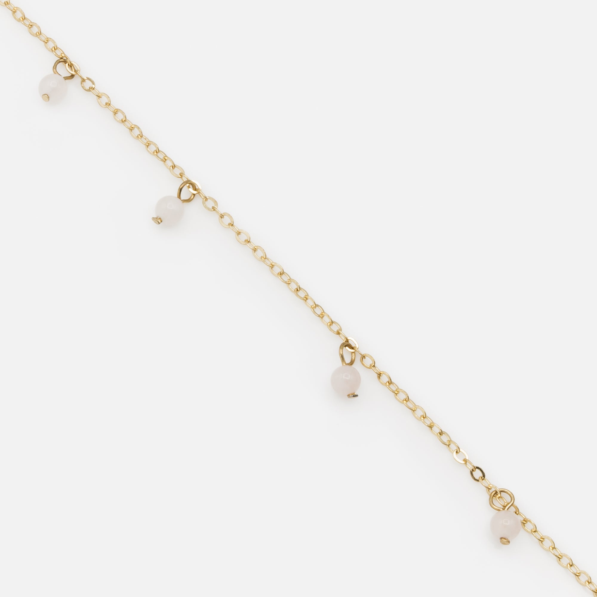 Gold anklet with pale pink beads