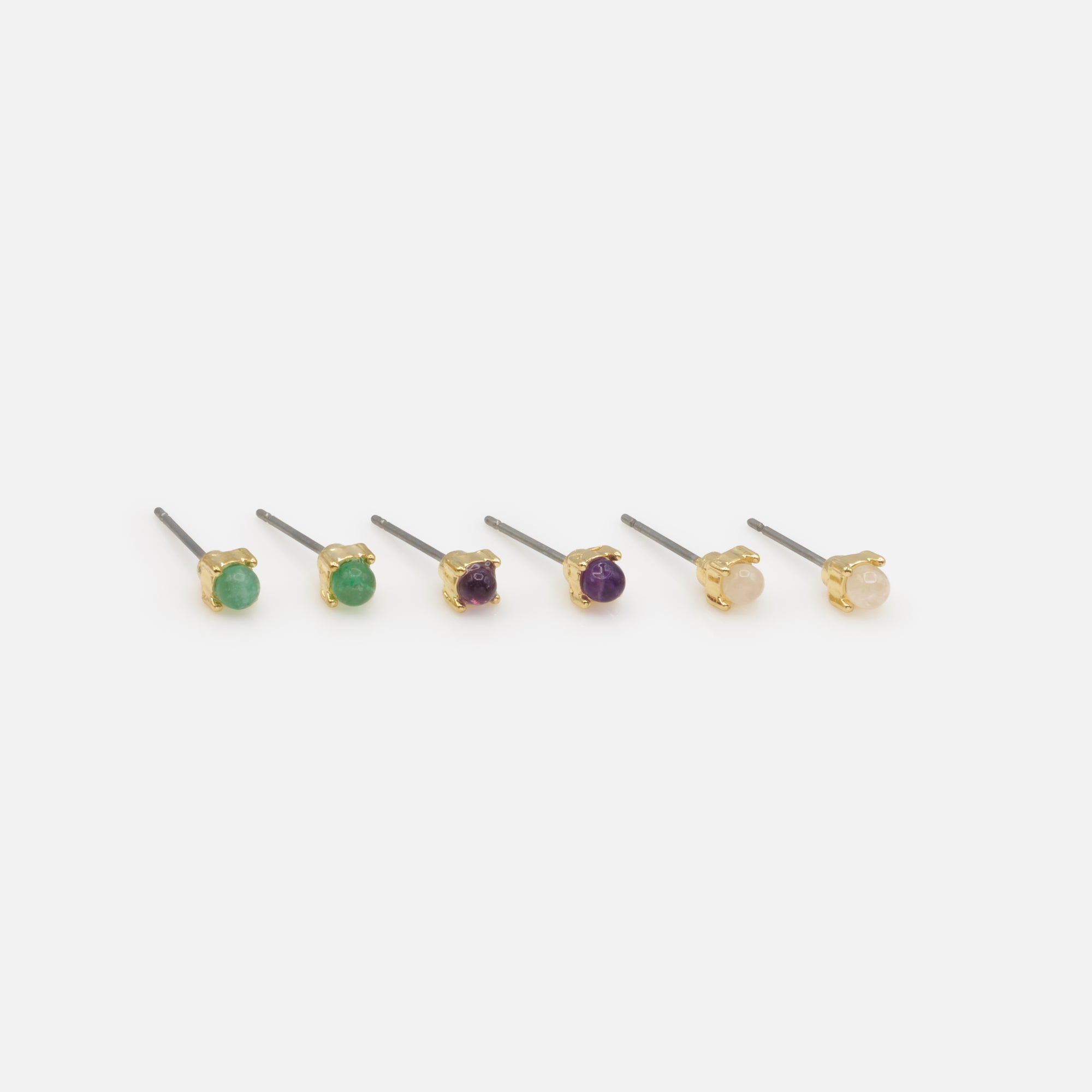 Set of three golden fixed earrings with colored round stones