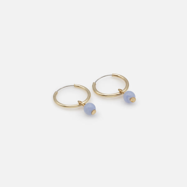 Load image into Gallery viewer, Golden hoop earrings with pale blue round stone charm
