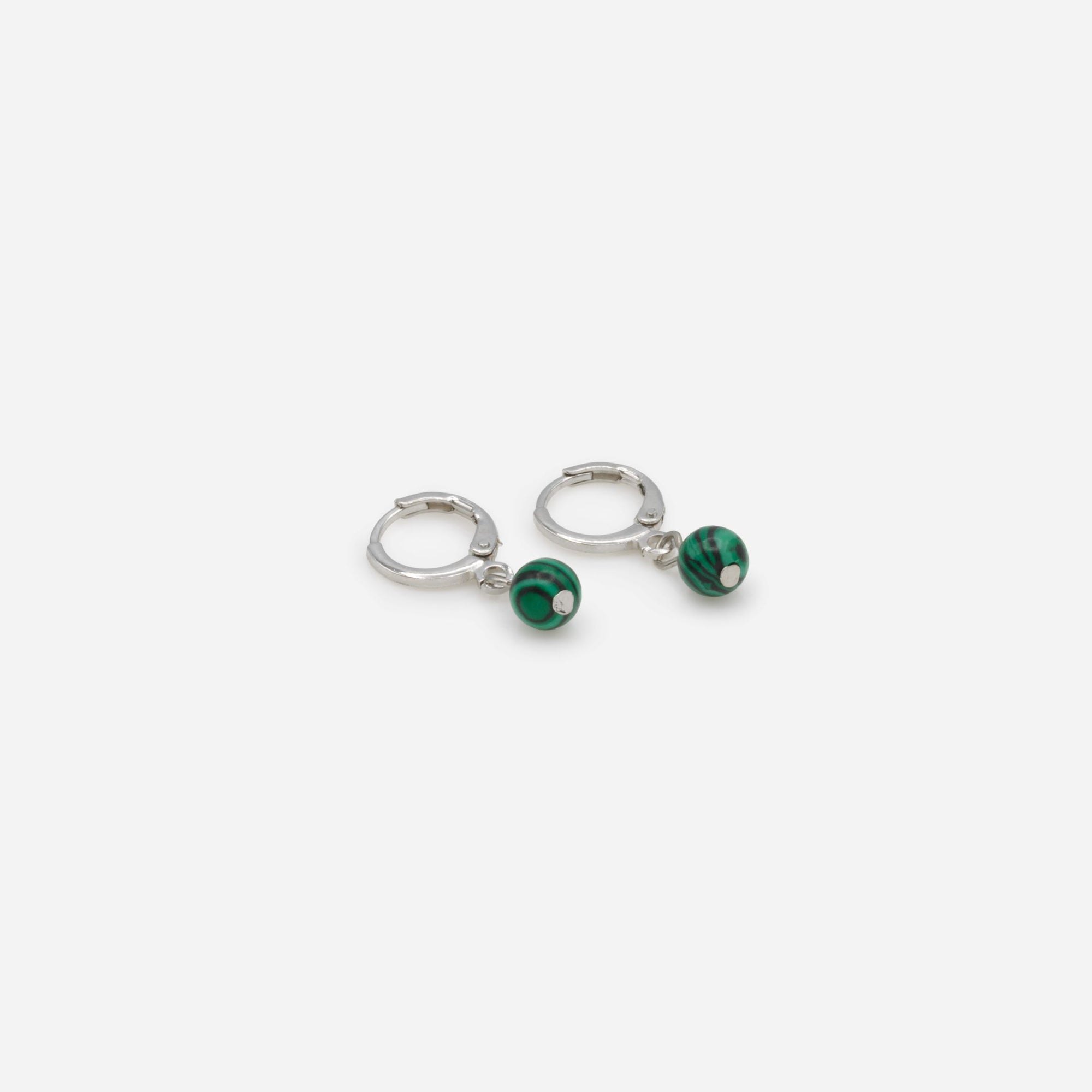 Silver hoop earrings with green zebra stone charm