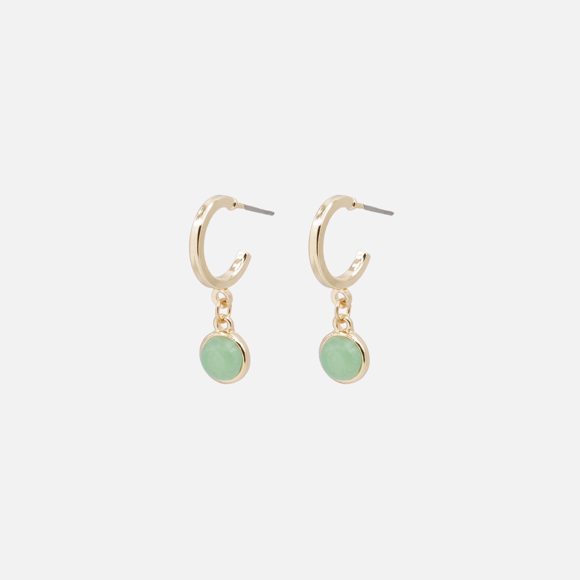 Open golden hoop earrings with pale green round stone charm