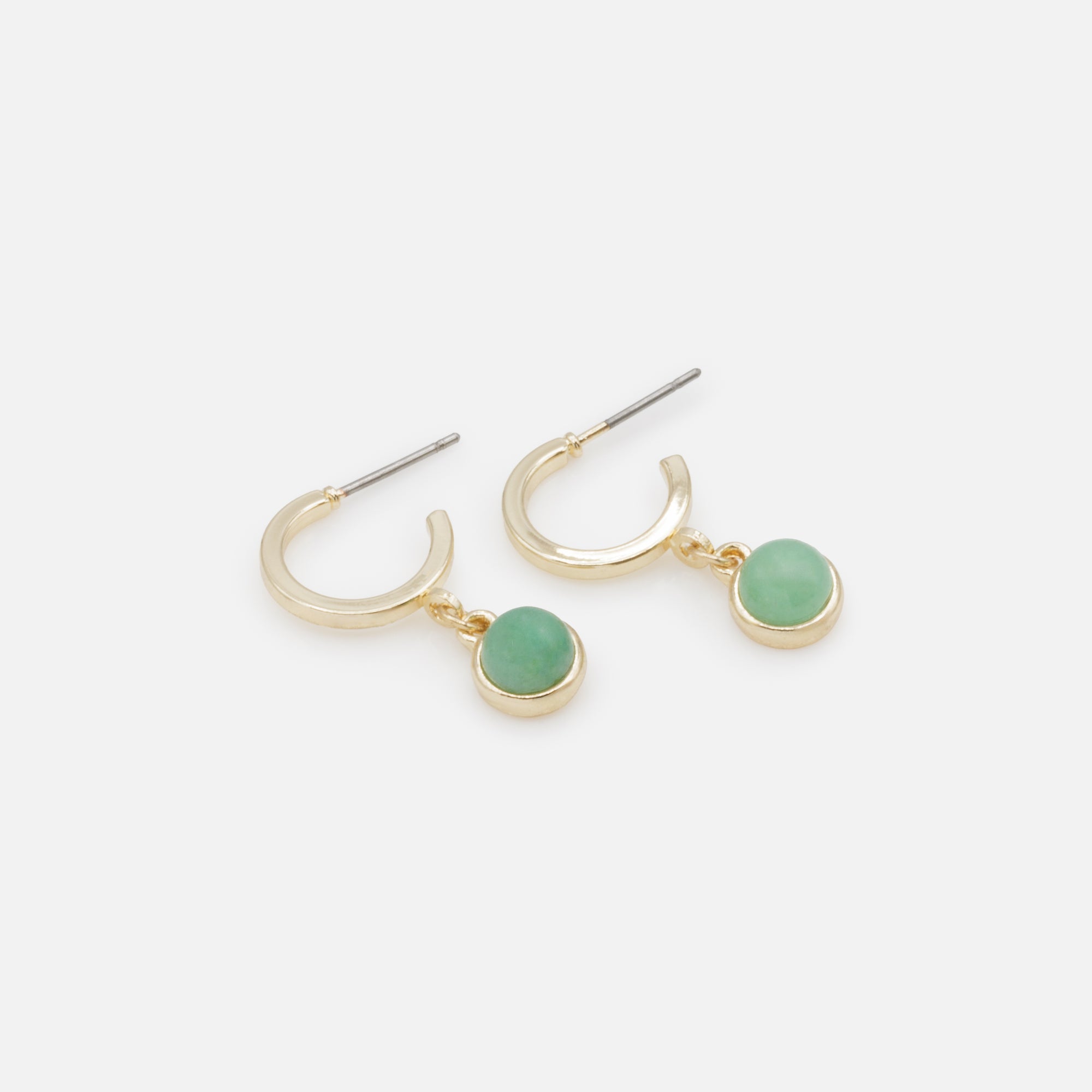 Open golden hoop earrings with pale green round stone charm