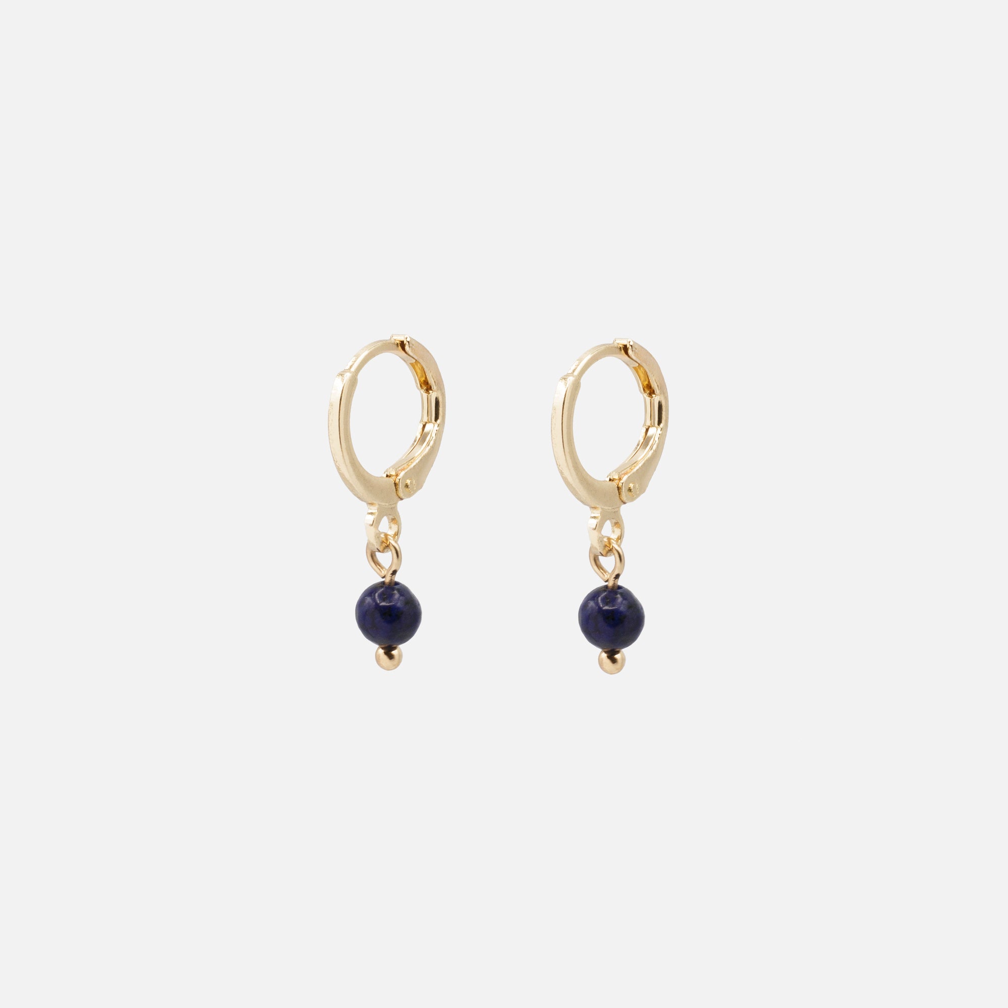 Gold hoop earrings with navy round stone charm