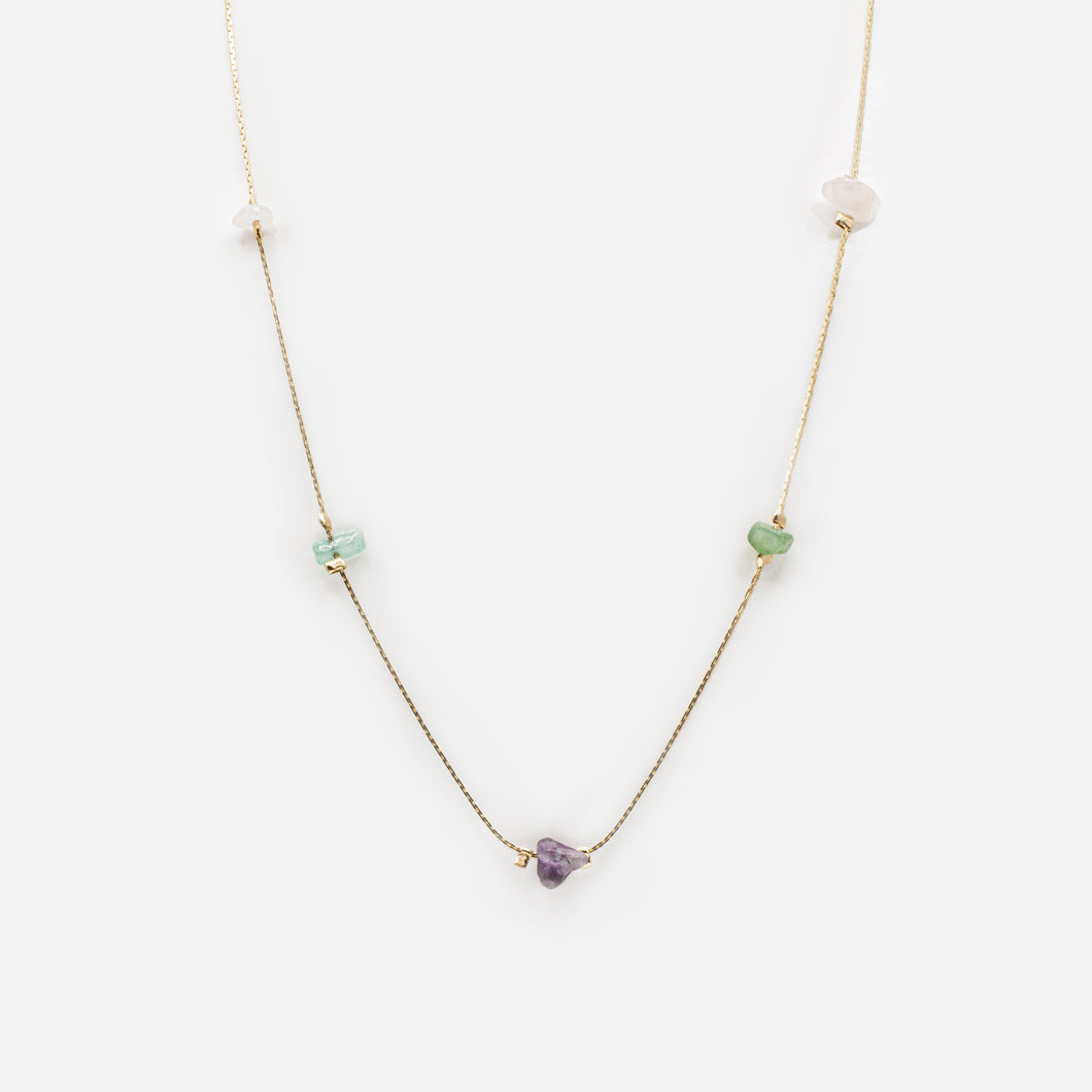 Gold necklace with flat links and colored stones