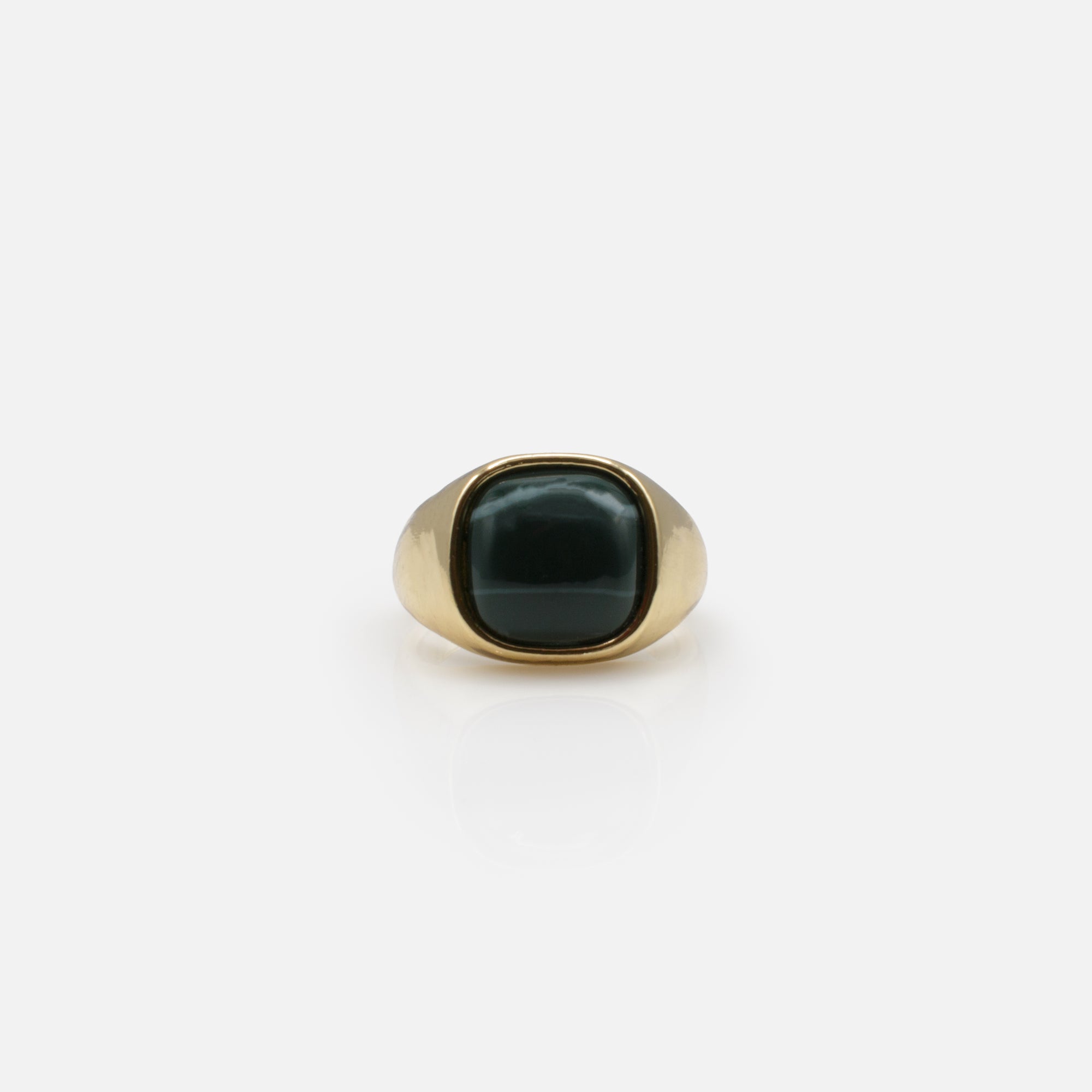 Golden open ring with green stone