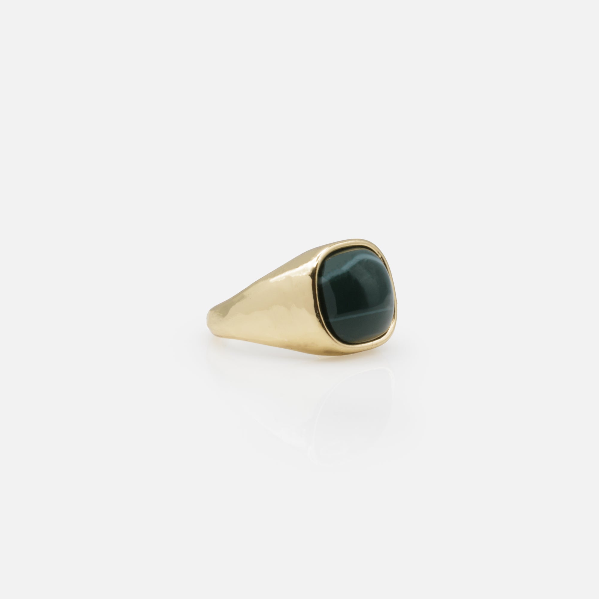 Golden open ring with green stone