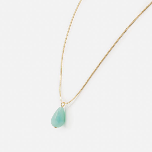 Load image into Gallery viewer, Gold necklace with large turquoise stone pendant
