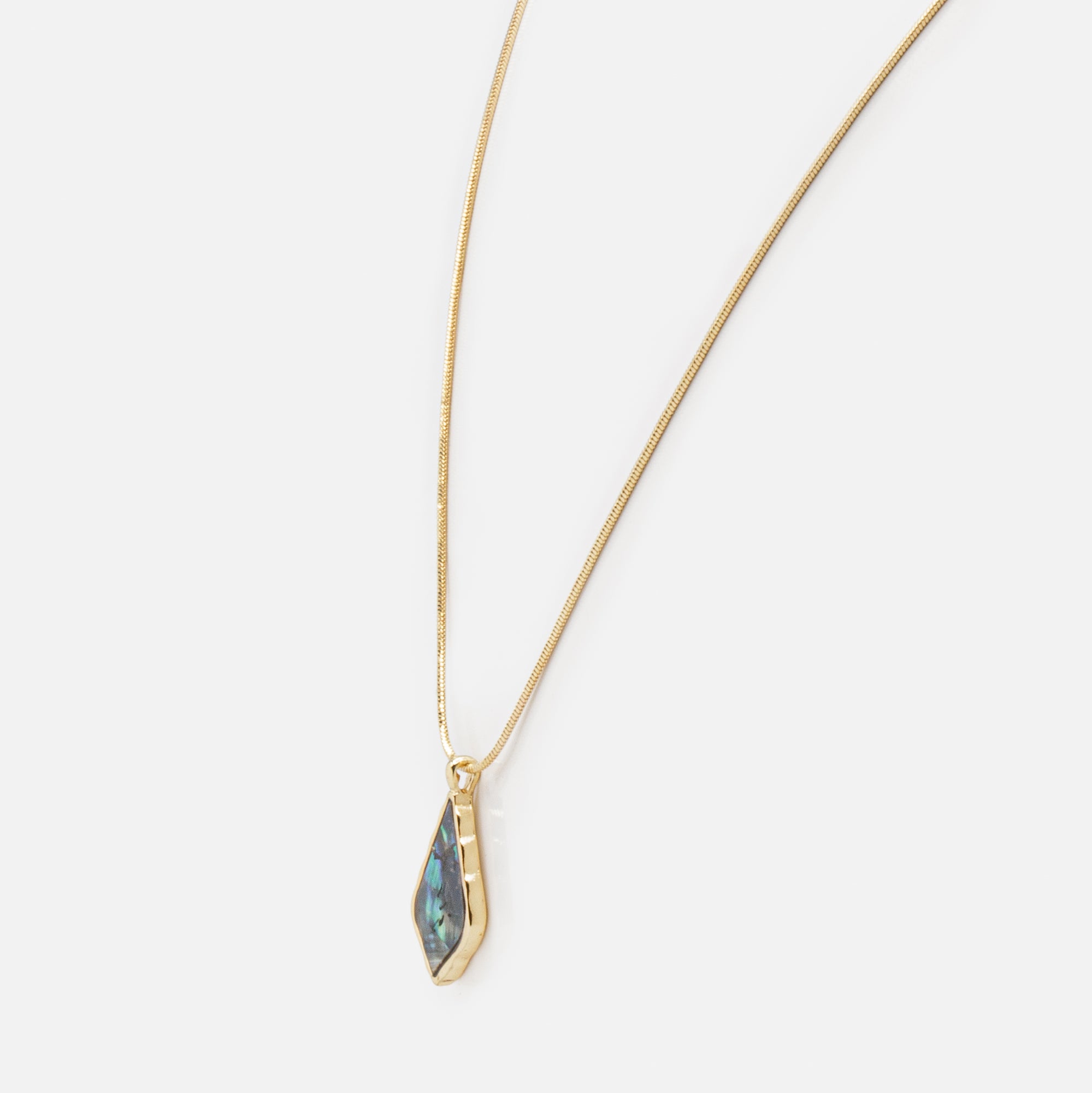 Imperfect diamond pendant gold necklace with multicolored stone