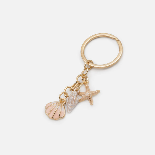 Load image into Gallery viewer, Gold keyring with seaside charms
