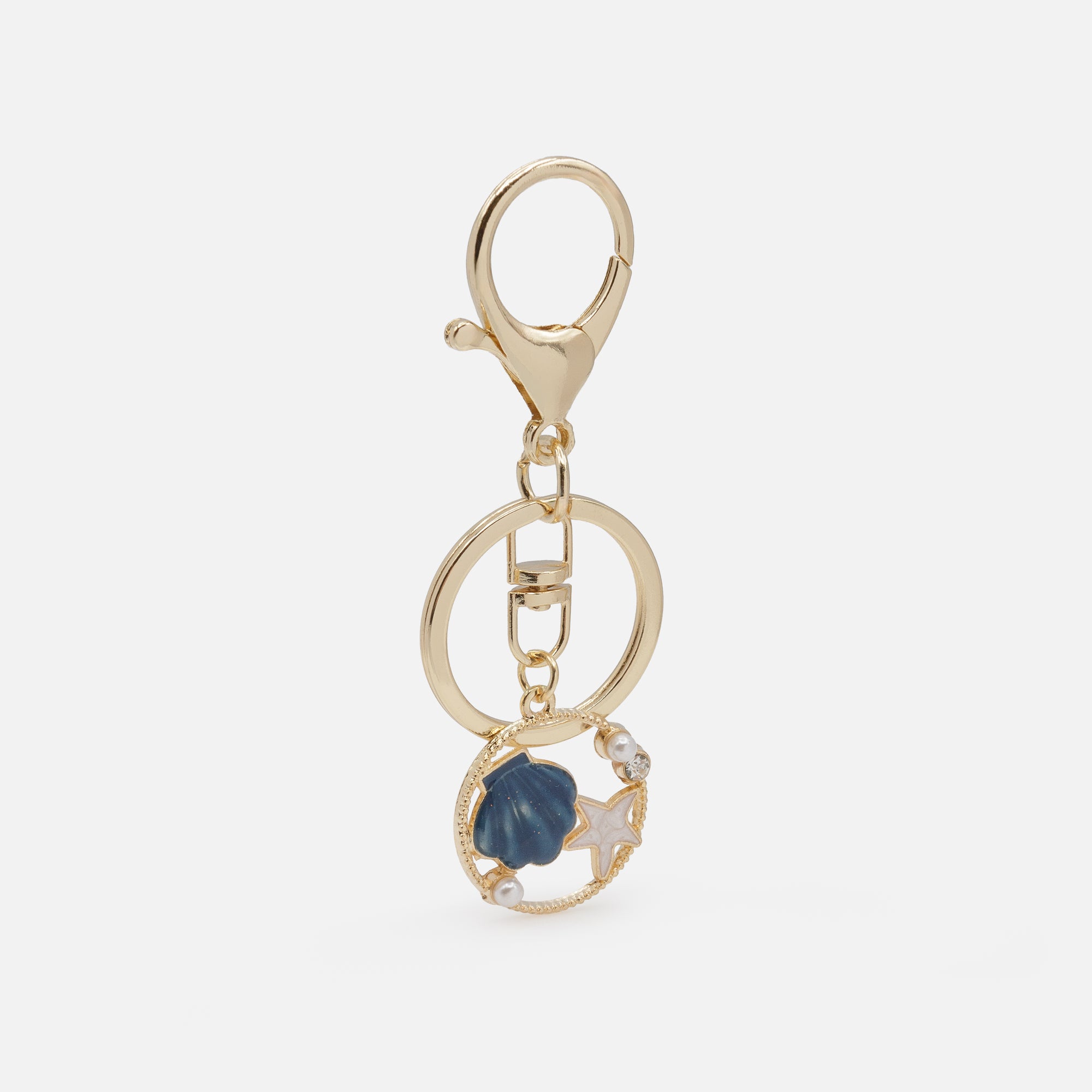 Golden pearl and shell key ring