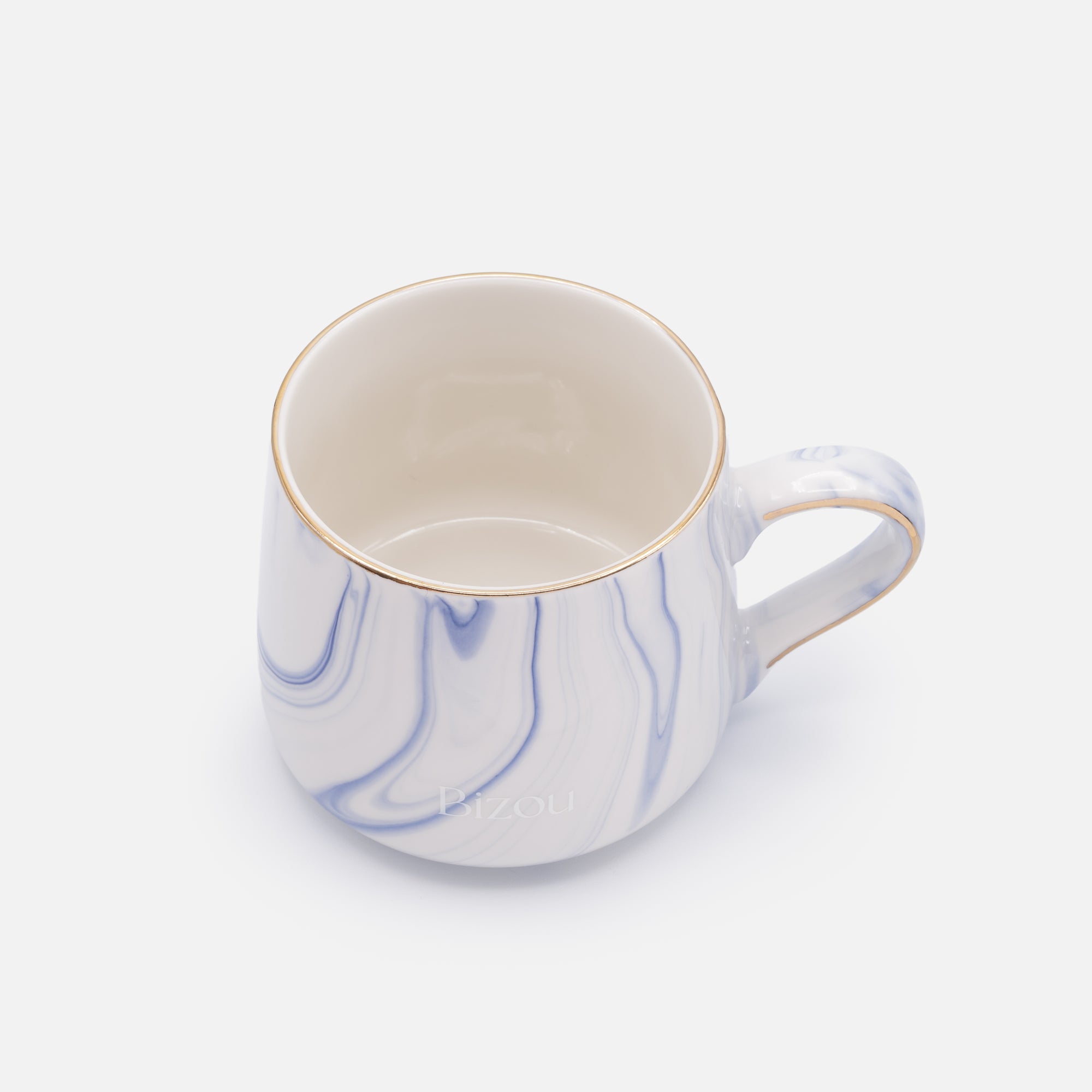 White ceramic mug with blue marbling