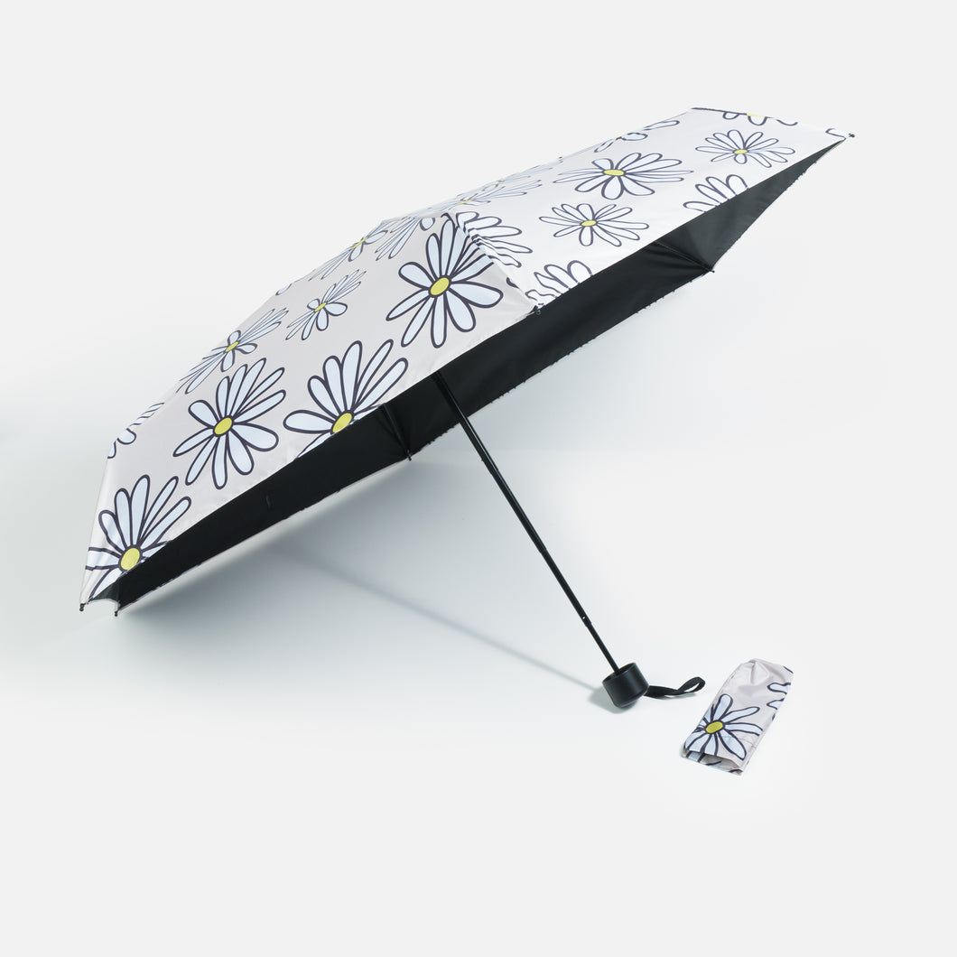 Beige umbrella with daisies and storage bag