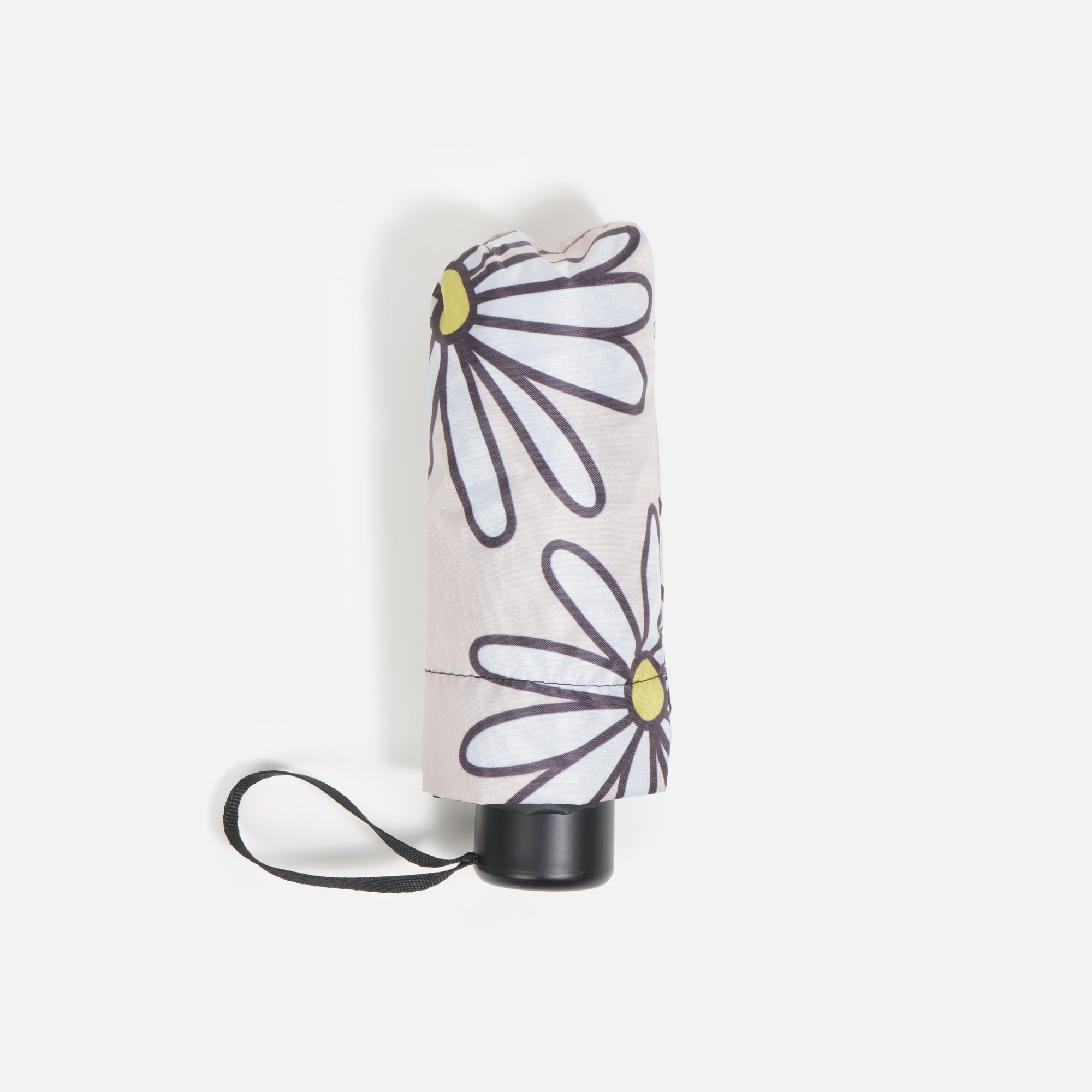 Beige umbrella with daisies and storage bag