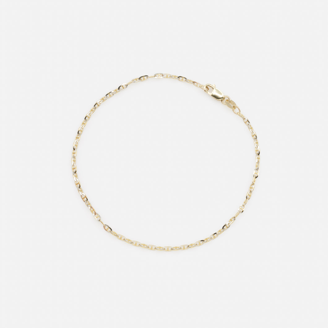 Small navy link bracelet in 10k gold