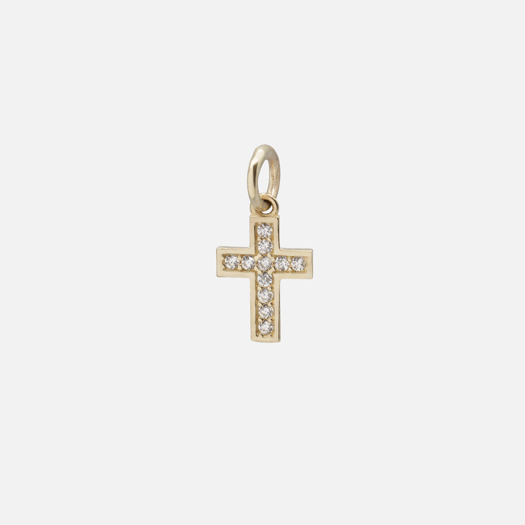 Small cross charm with cubic zirconia interior in 10k gold