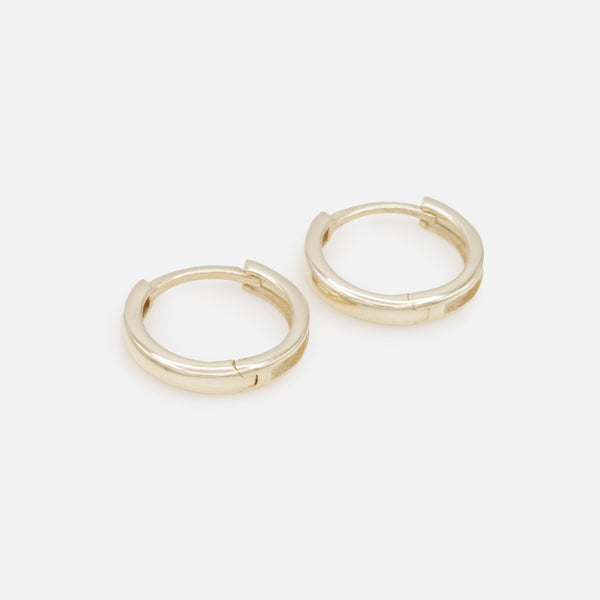 Load image into Gallery viewer, 12mm huggie earrings in 10k gold
