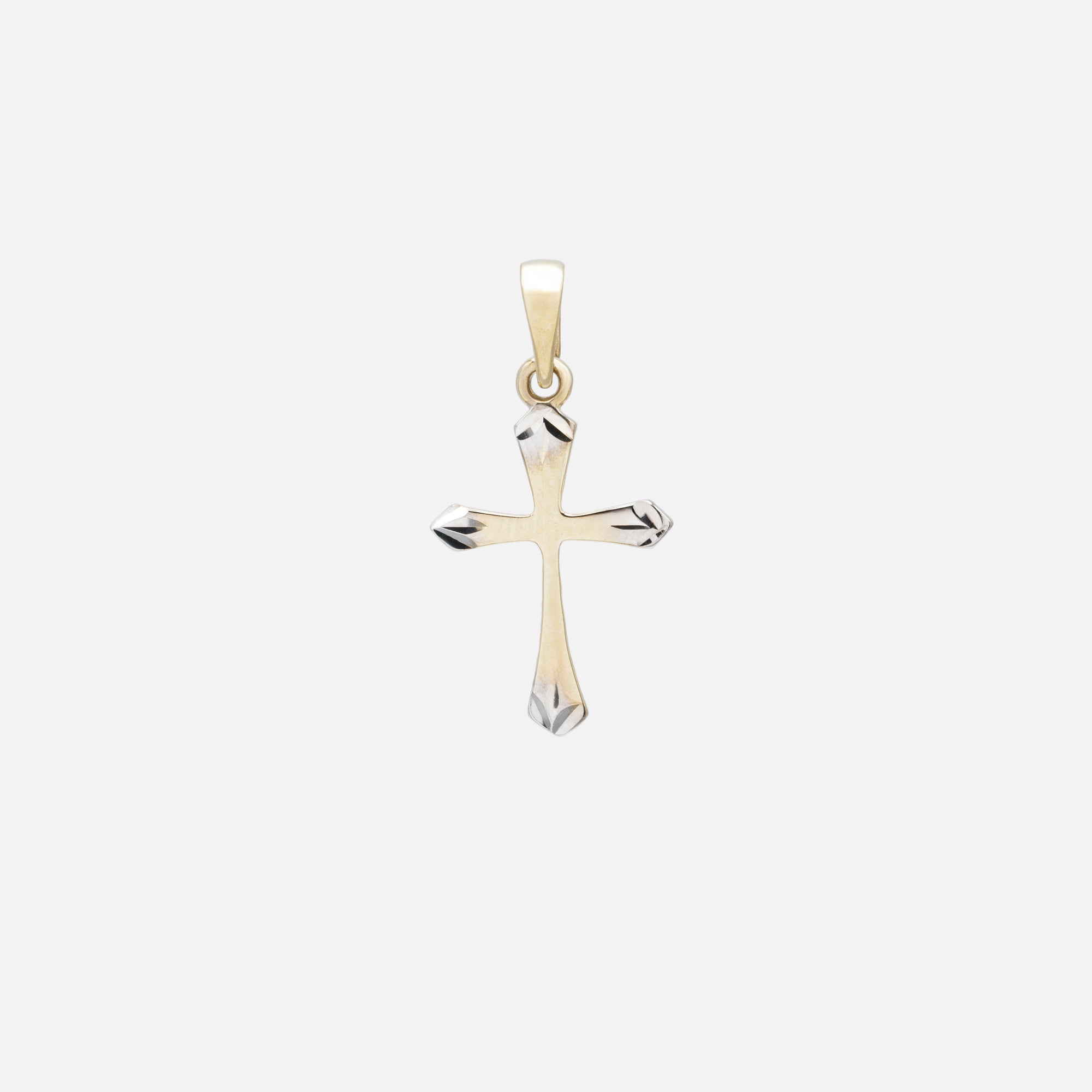 2-tone cross charm with end detail in 10k gold