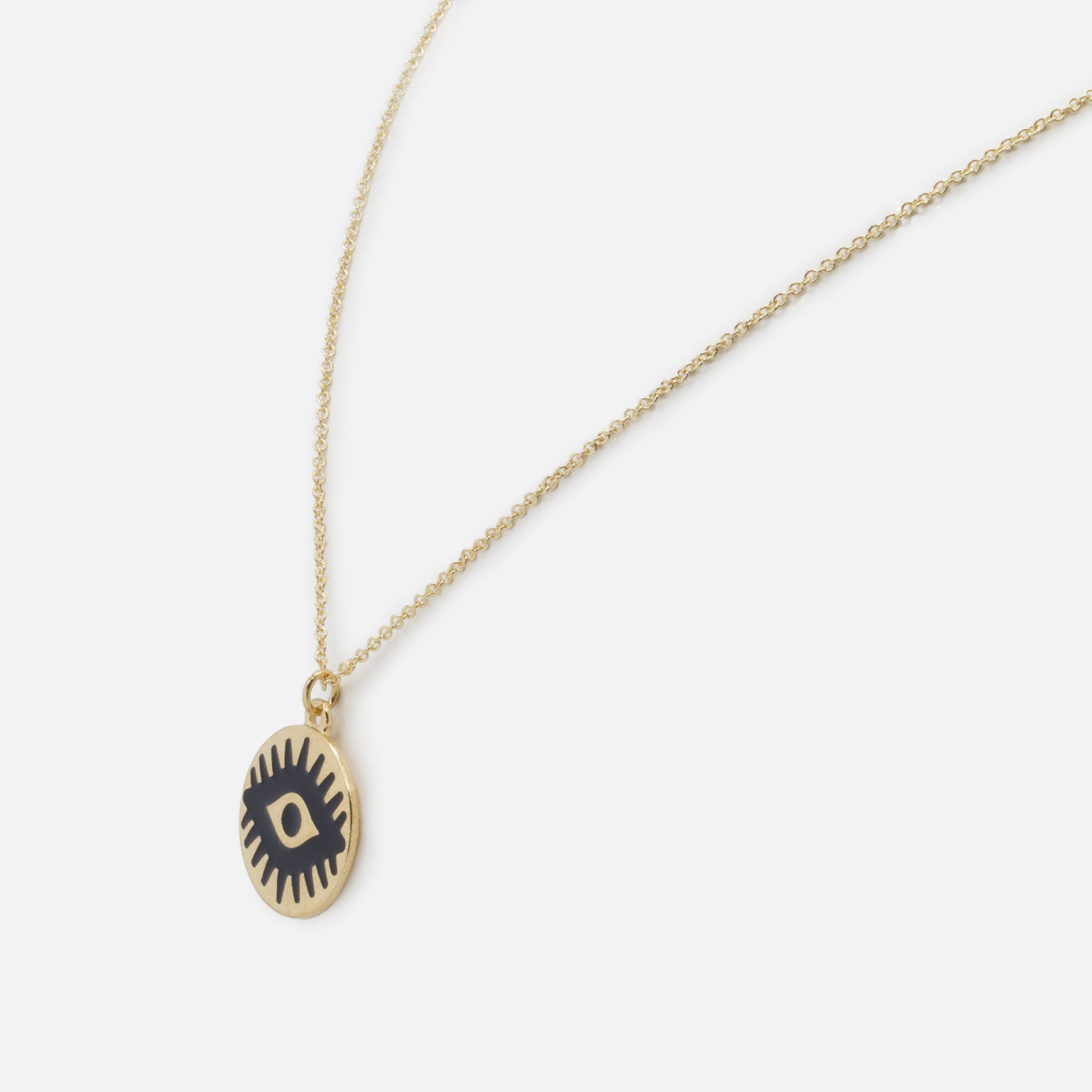 Collier doré pendentif oeil protecteur