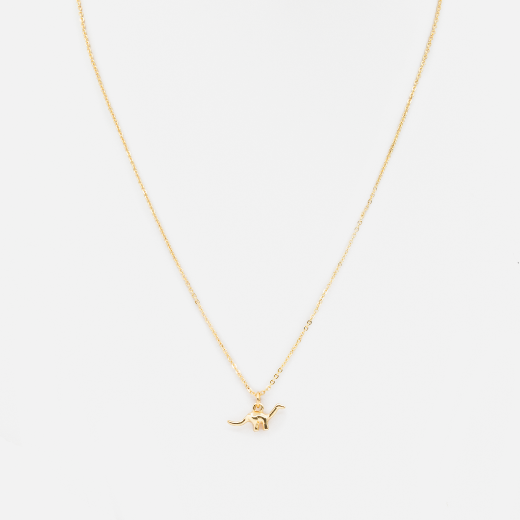 Golden chain with dinosaur charm