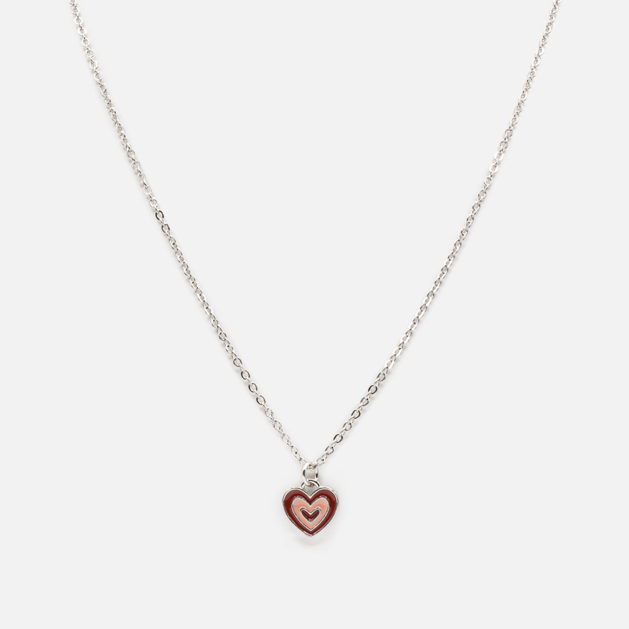 Silver necklace with red and pink heart pendant