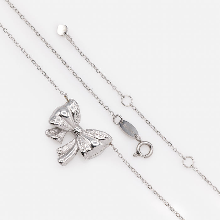 Mini silver necklace with oversized stainless steel buckle charm
