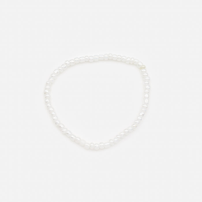 Duo de chaînes de cheville extensibles pierres blanches et billes dorées