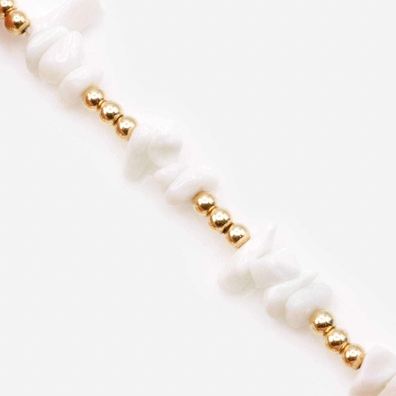 Duo of extendable anklets with white stones and gold beads