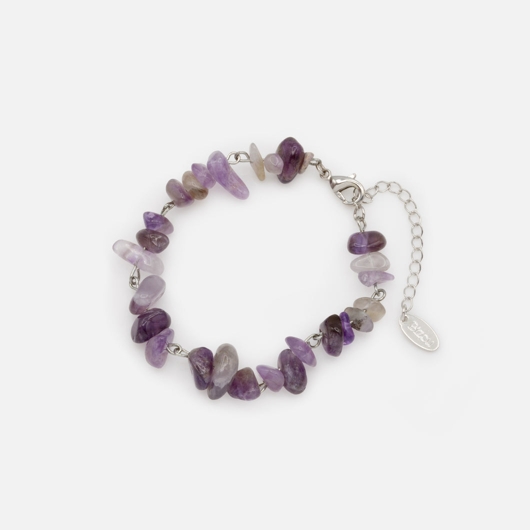 Bracelet argenté à pierres mauves