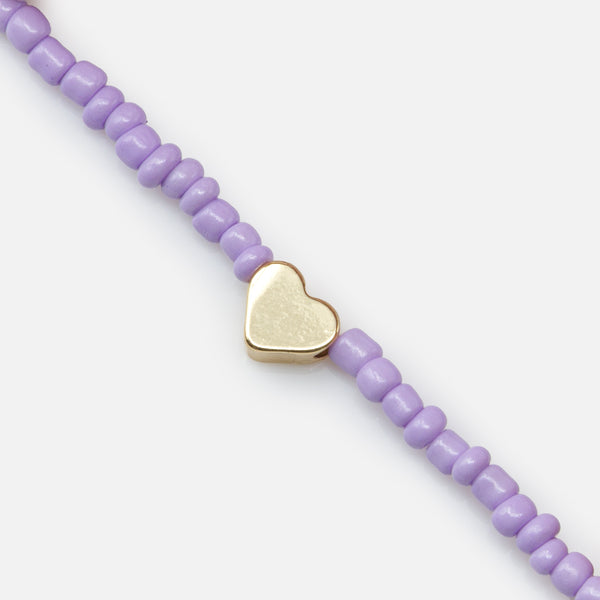 Load image into Gallery viewer, Trio of multicolored elastic bracelets with small golden hearts
