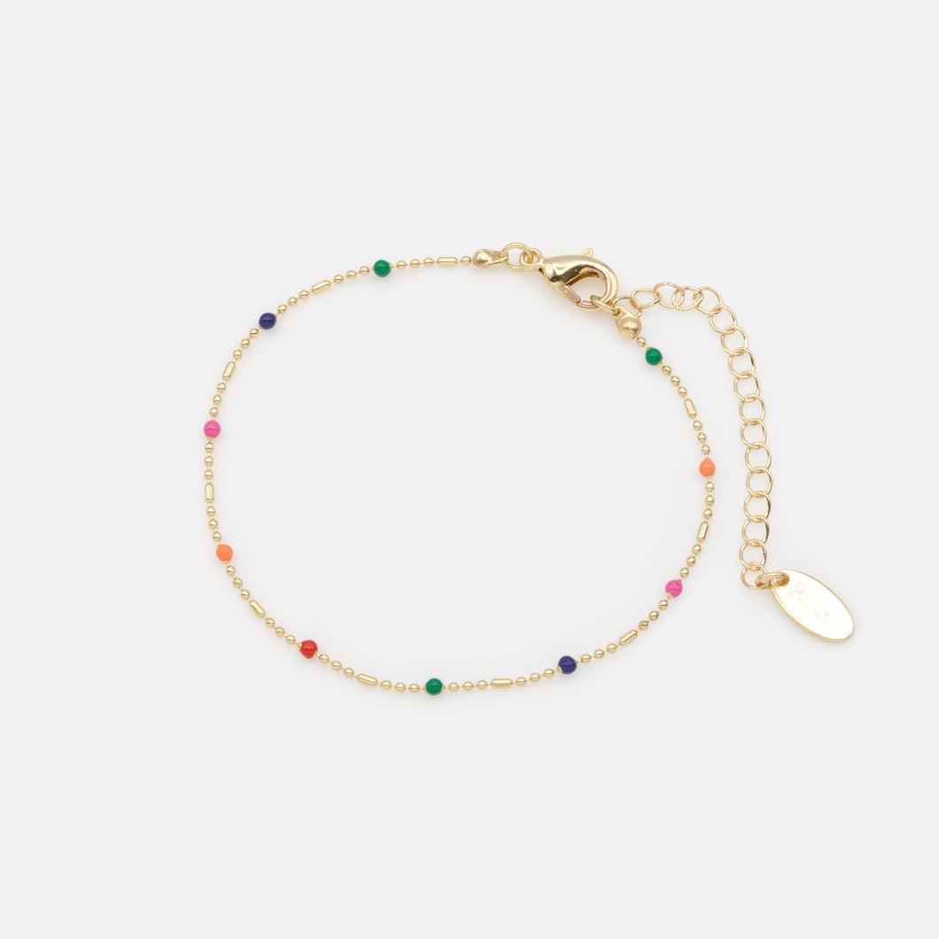 Bracelet délicat doré avec billes colorées