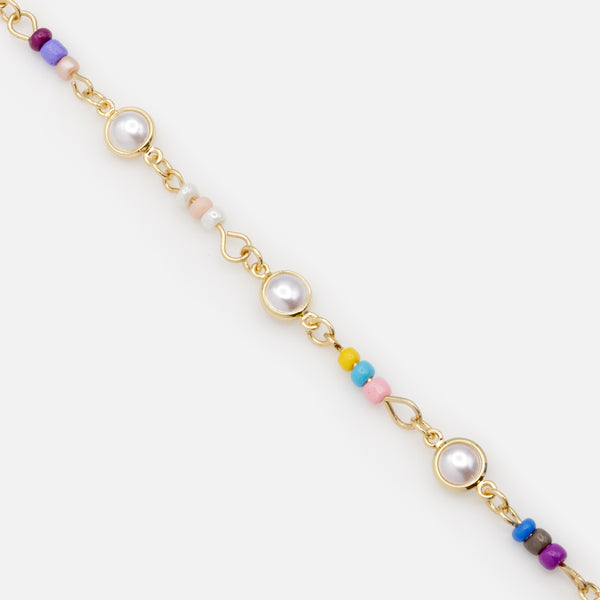 Load image into Gallery viewer, Gold bracelet with beads and beads in trio
