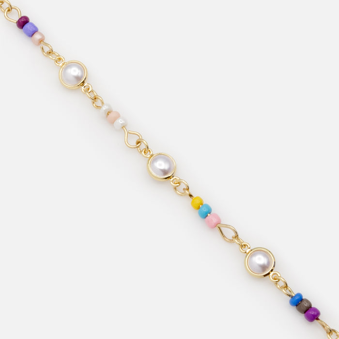 Bracelet doré perles et billes en trio
